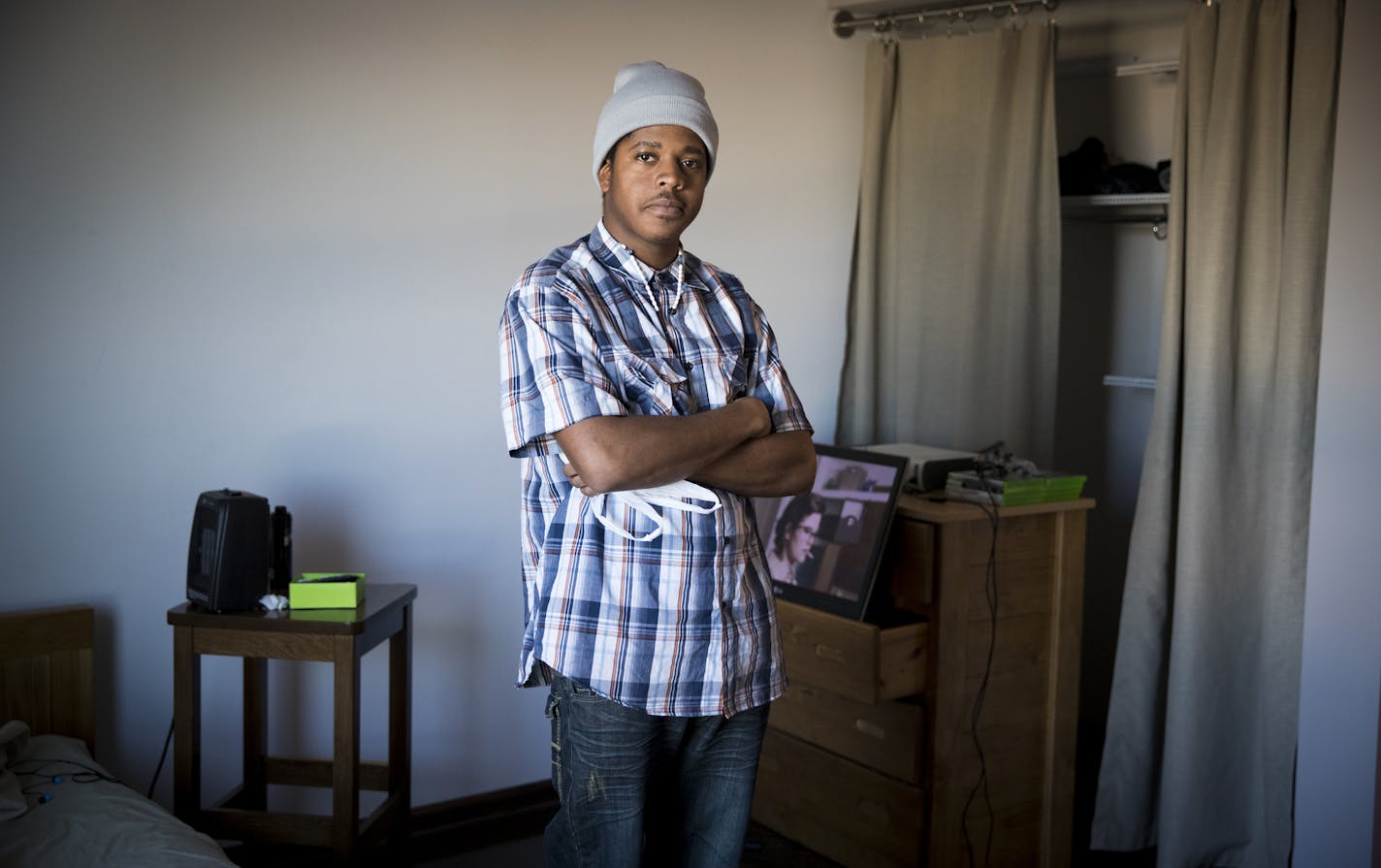 Derrick Wade, 22, stood in his apartment at Prior Crossing on Thursday, November 3, 2016 in St. Paul, Minn. Before moving to the studio apartment in September, Wade spent many nights homeless sleeping on people's floors with a blanket. ] RENEE JONES SCHNEIDER &#x2022; renee.jones@startribune.com Prior Cross is a 44 studio apartment for homeless youth.