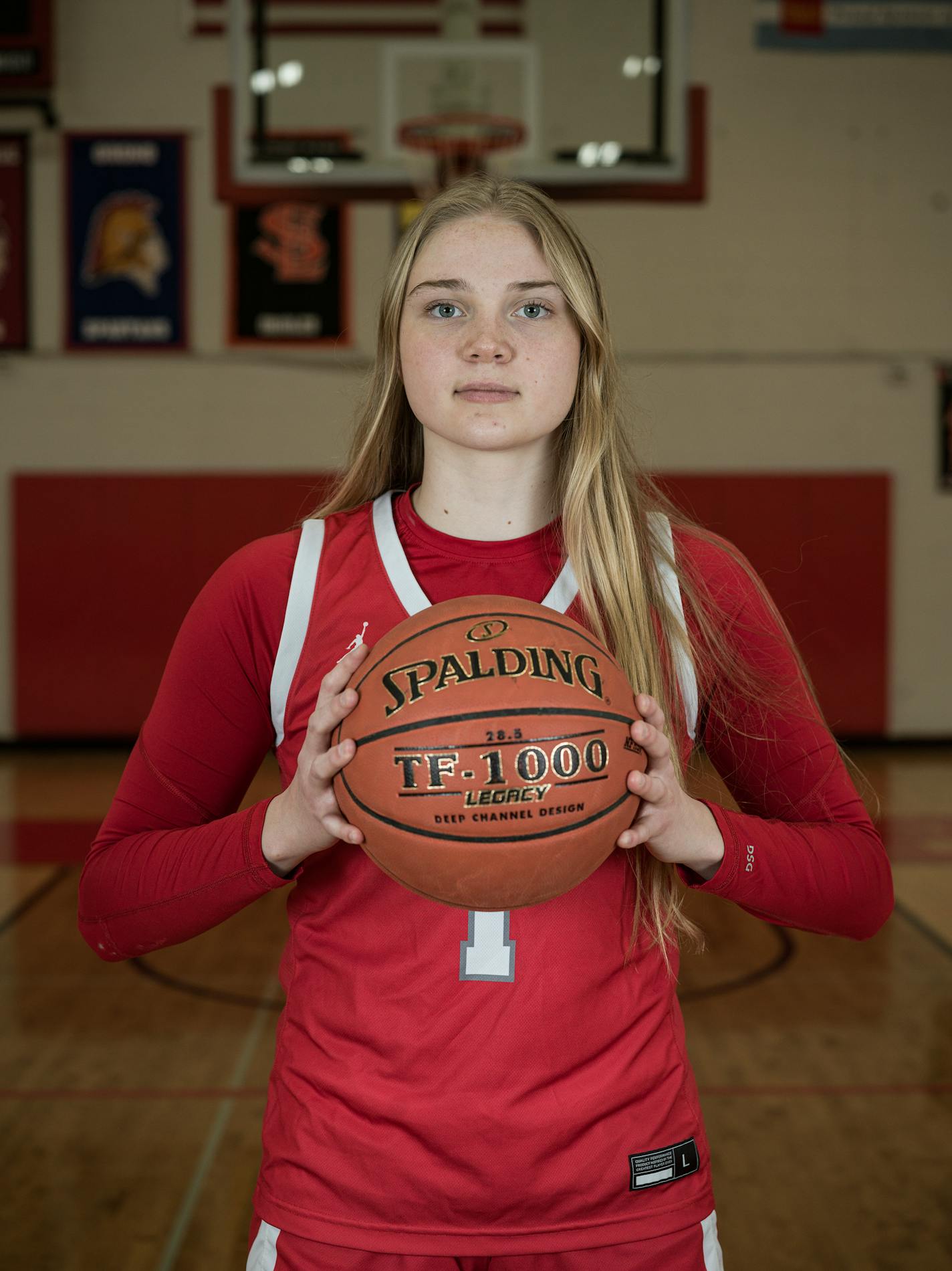 Olivia Olson of Benilde-St. Margaret(1) is part of the All-Metro girls basketball team in St. Louis Park, Minn., on {wdat). This is for the girls basketball All-Metro team and Metro Player of the Year. ] RICHARD TSONG-TAATARII • richard.tsong-taatarii @startribune.com