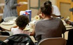 Homeless women and children eat lunch at day shelter The Family Place Thursday, Sept. 19, 2019, in St. Paul, MN.