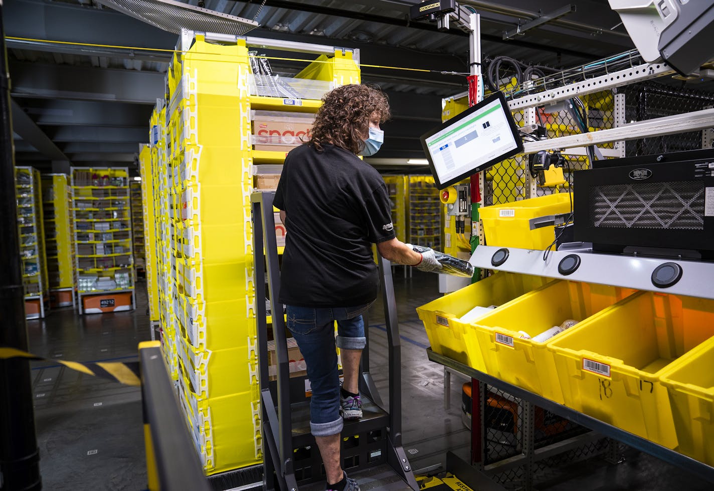 Marie Steele worked as a picker at Amazon's Shakopee fulfillment center. ] LEILA NAVIDI • leila.navidi@startribune.com BACKGROUND INFORMATION: Amazon's Shakopee fulfillment center on Thursday, October 8, 2020.