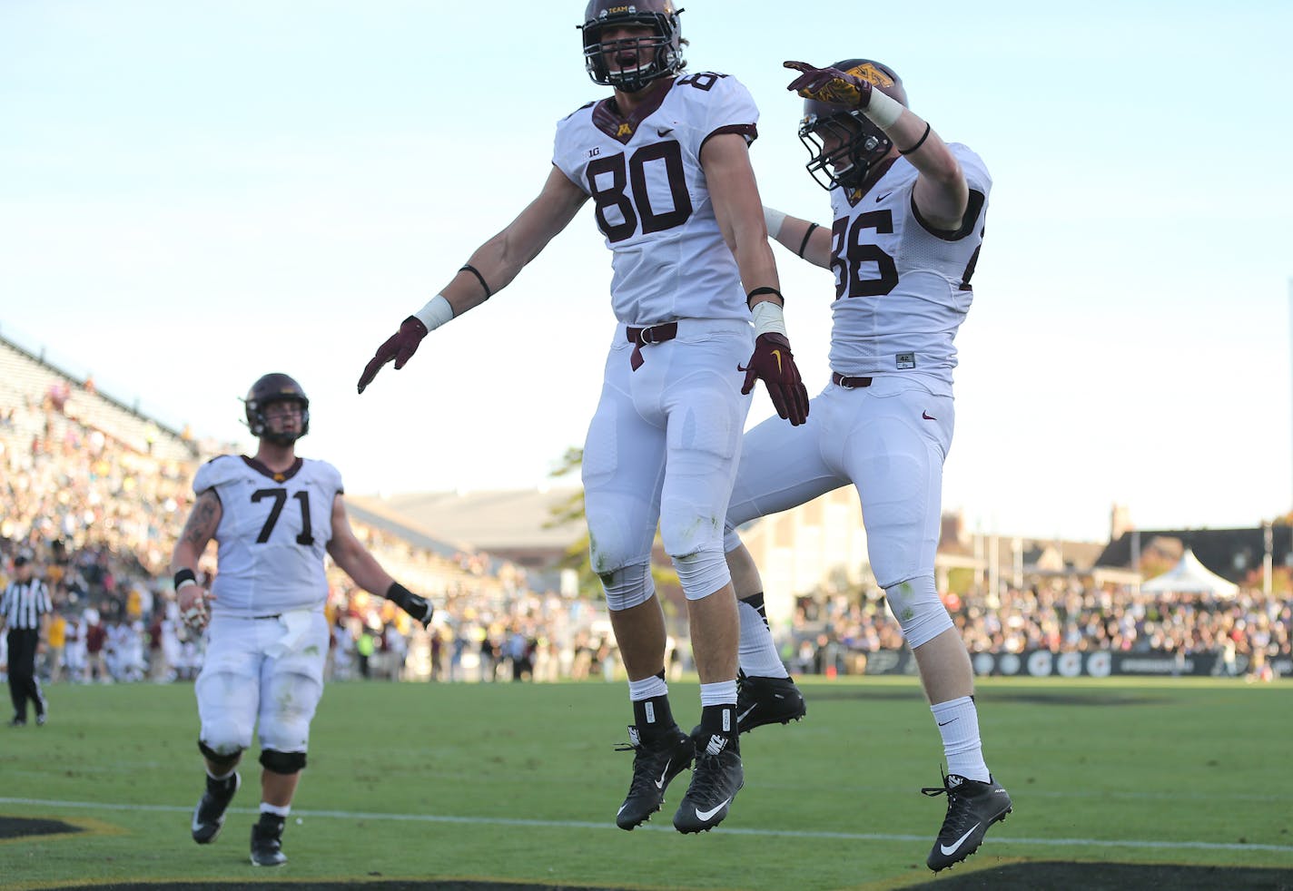 Minnesota Golden Gophers tight end Brandon Lingen (86), and Minnesota Golden Gophers tight end Nate Wozniak (80) celebrated after Lingen scored a touchdown during third quarter. ] (LEILA NAVIDI/STAR TRIBUNE) leila.navidi@startribune.com Gophers vs Purdue at Ross-Ade Stadium in West Lafayette., Saturday October 10, 2015. ORG XMIT: MIN1510101750010592