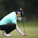 Hyo Joo Kim lined up putt on the 18th green at Hazeltine National on Thursday. She made up for a missed cut at the U.S. Women's Open with a convincing