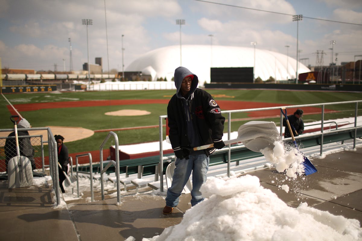Siebert Field isn't always ready when the Gophers baseball season arrives, as this shoveling crew in the spring of 2014 demonstrates. This year's Goph