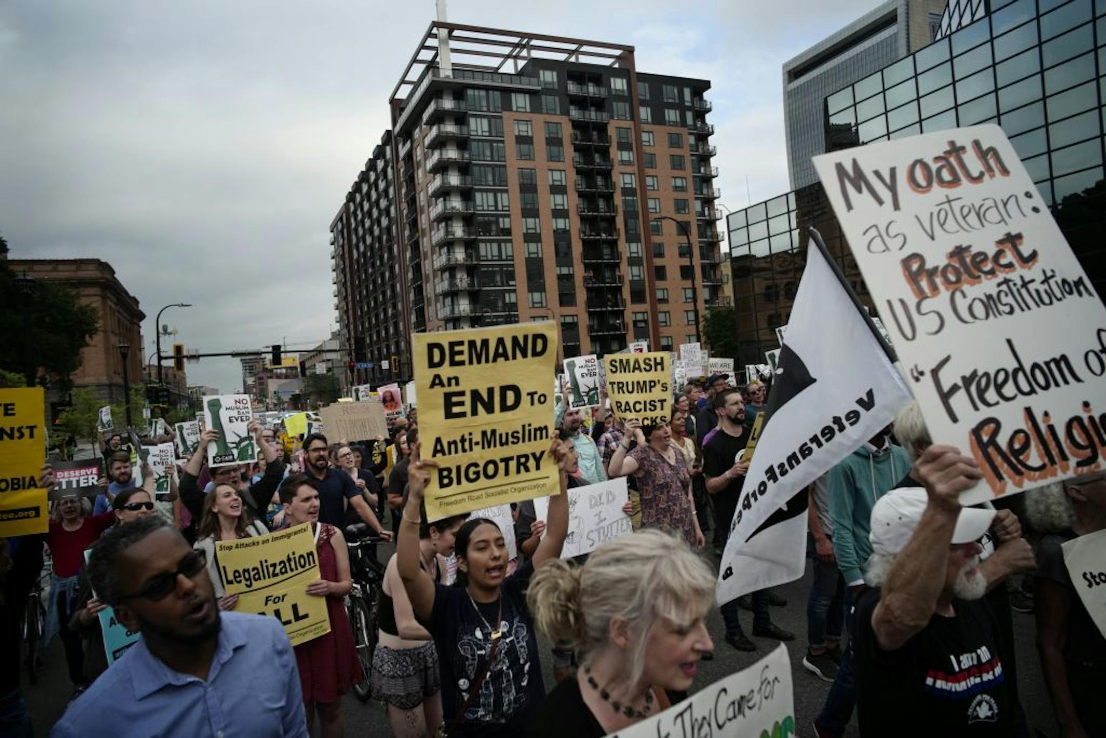 A few hundred protesters marched Tuesday night in downtown Minneapolis to show their displeasure at the Supreme Court's decision to uphold President DOnald Trump's travel ban.