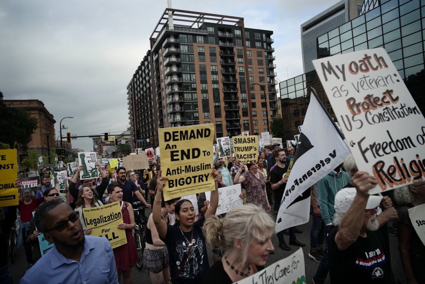 A few hundred protesters marched Tuesday night in downtown Minneapolis to show their displeasure at the Supreme Court's decision to uphold President DOnald Trump's travel ban.