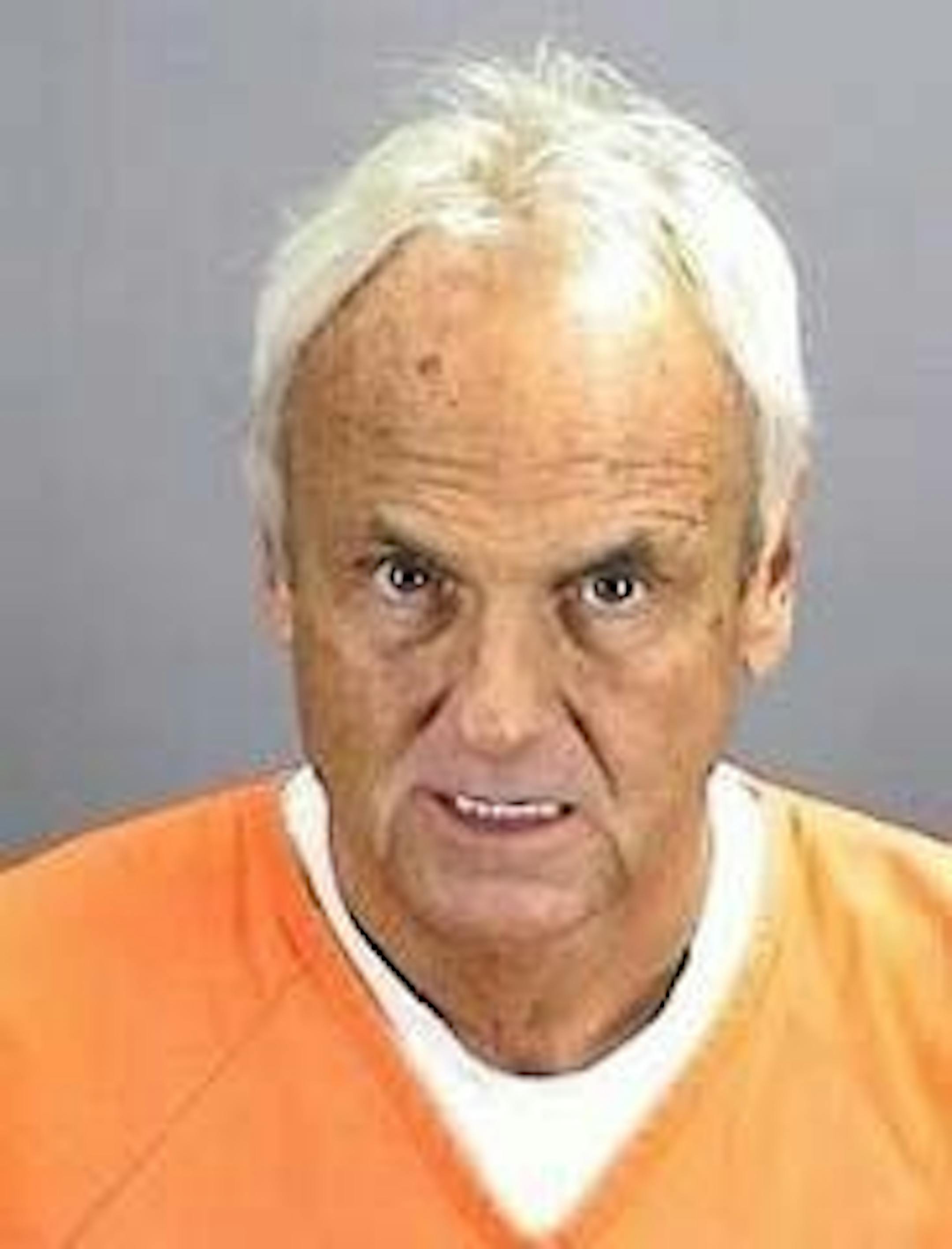 FILE - In this Oct. 18, 2010 file photo provided by the Sherburne County Sheriff's Dept. via St. Paul Pioneer Press former auto magnate Denny Hecker is shown. One-time auto magnate Denny Hecker is scheduled to be sentenced Friday, in a scheme that prosecutors say duped lenders out of millions so Hecker could maintain his "high-flying lifestyle." The 58-year-old Hecker pleaded guilty in September to two fraud-related charges.