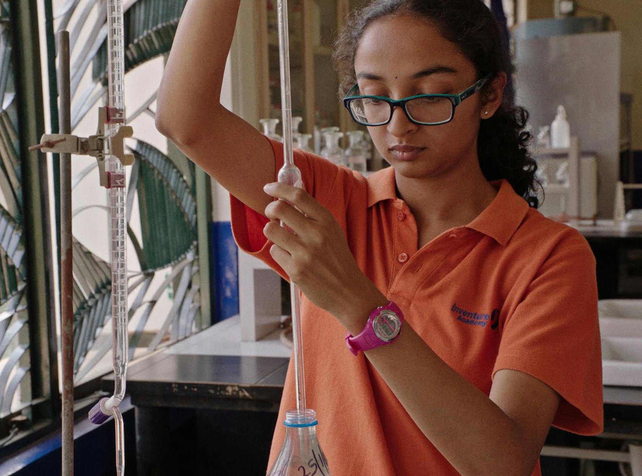 Sahithi in the lab on "Inventing Tomorrow."