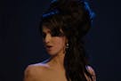 Actor Marisa Abela playing Amy Winehouse in a scene from "Back to Black."