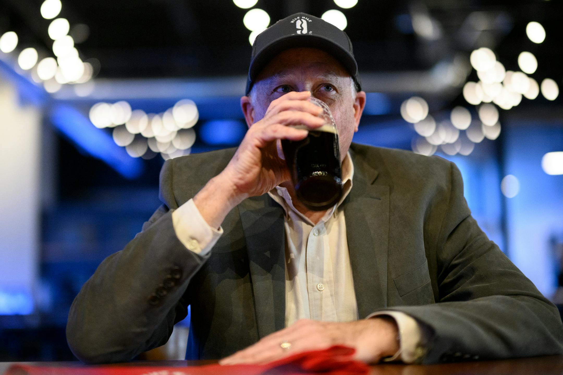 Founders club member Robert Endly drinks a beer at the bar Wednesday, Feb. 9, 2022 at Nine Mile Brewing in Bloomington, Minn.