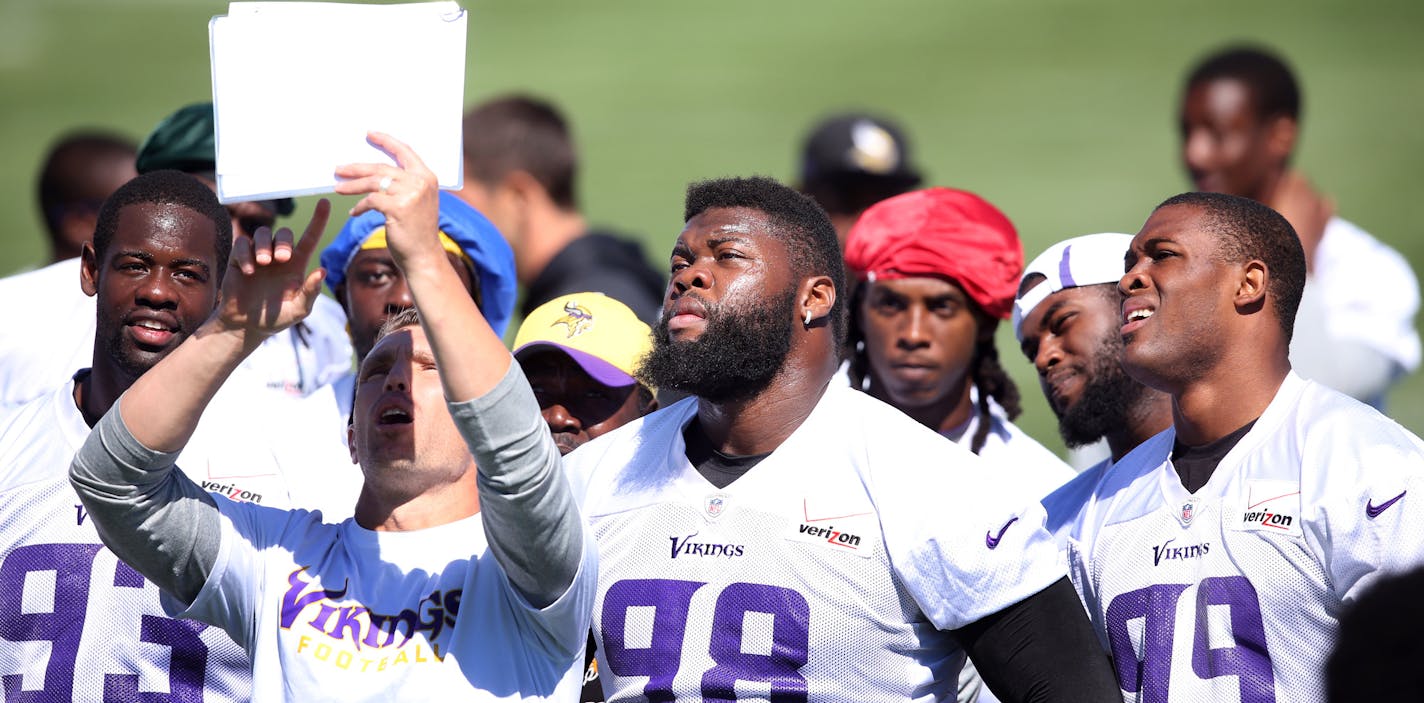 Defensive linemen Shamar Stephen (93), Lineal Joseph (98), and Danielle Hunter looked over plays during Vikings training camp at Minnesota State University Mankato Wednesday July 29, 2015 in Mankato, MN. ] Jerry Holt/ Jerry.Holt@Startribune.com