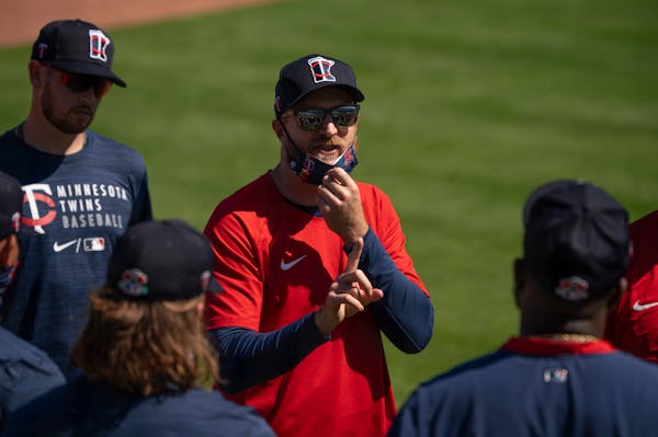 Twins manager Rocco Baldelli gave instructions to players before a drill began Tuesday morning.