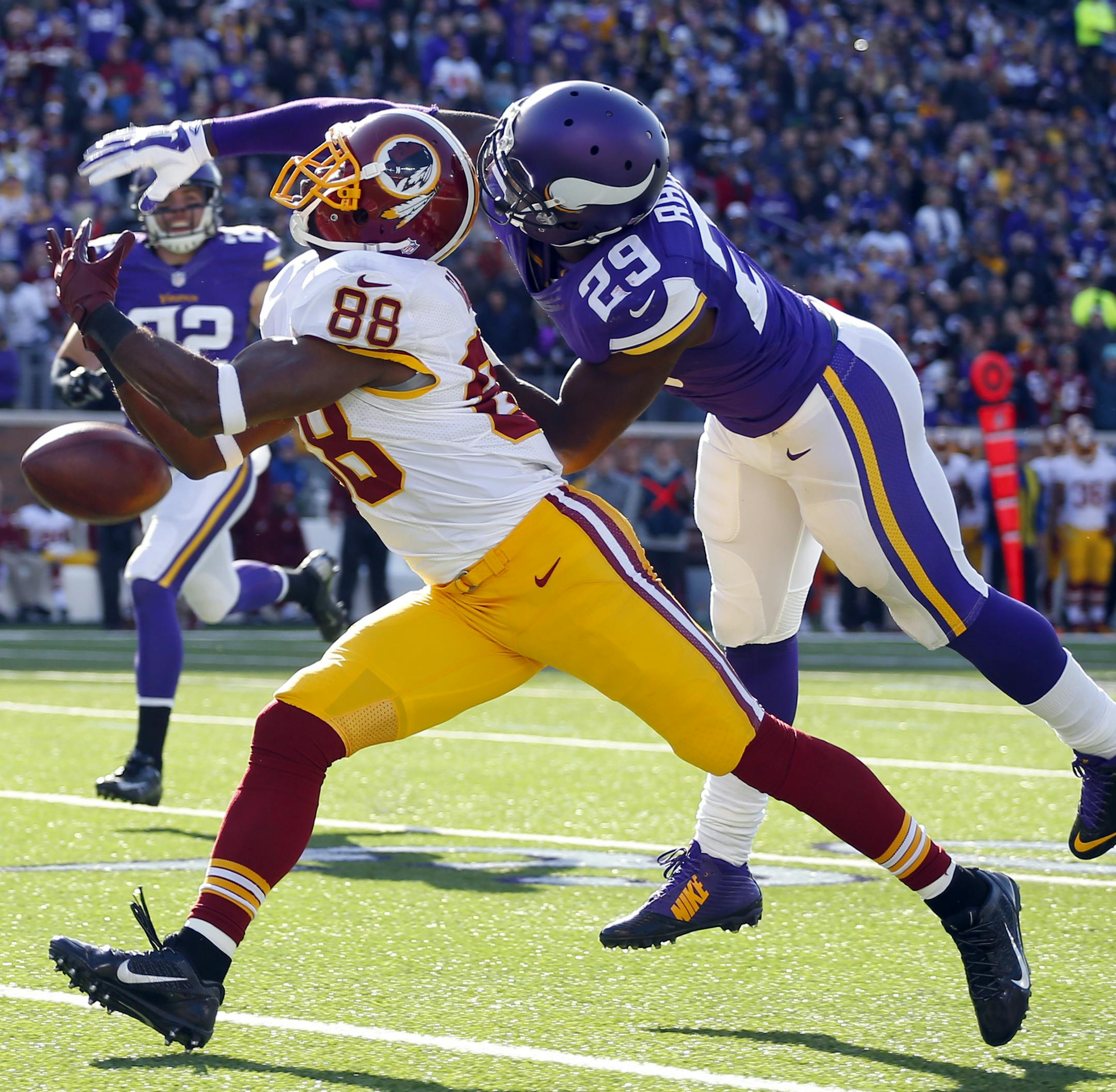 Minnesota Vikings cornerback Xavier Rhodes (29) defends the pass to Washington Redskins wide receiver Pierre Garcon (88) during an NFL football game, Sunday, Nov. 2, 2014, in Minneapolis. (Jeff Haynes/AP Images for Panini)