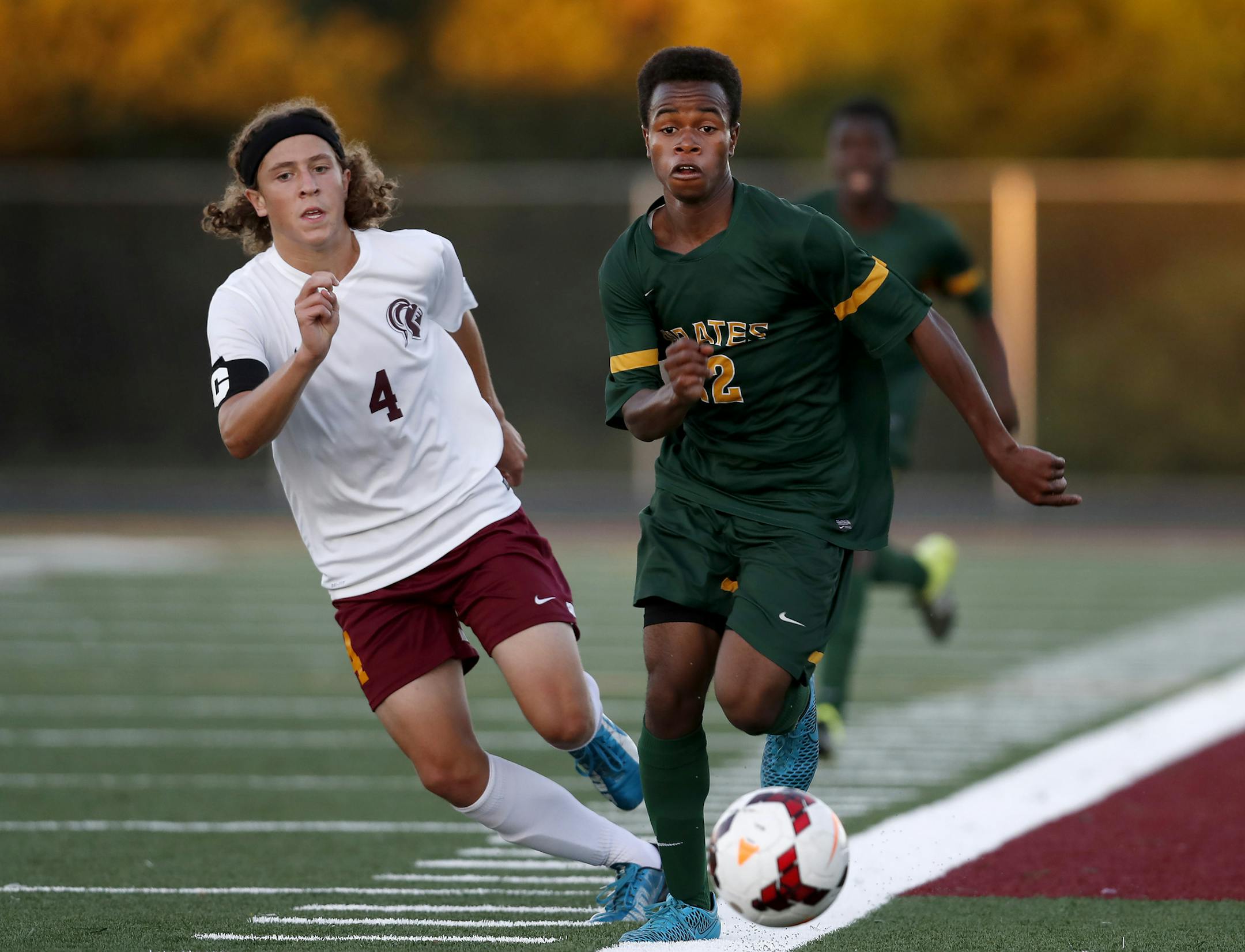 Timothy Frantz (4) of Irondale and Austin Peters (12) of Park Center fought for the ball in the first half. ] CARLOS GONZALEZ cgonzalez@startribune.com - August 30, 2016, New Brighton, MN, High School Prep Soccer, Park Center vs. Irondale