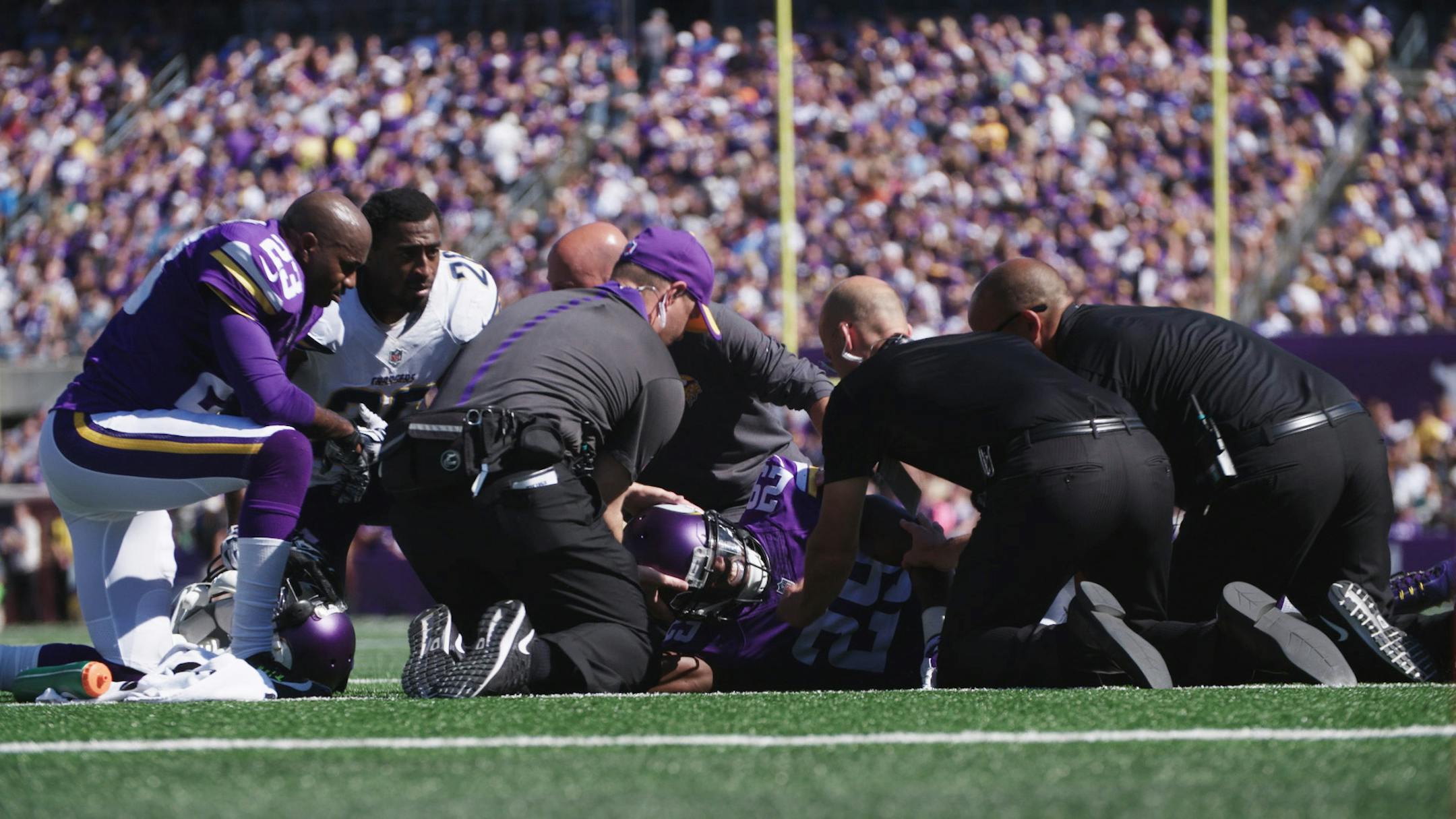 Vikings staff rolled cornerback Xavier Rhodes onto his back after he collided with safety Andrew Sendejo during the second quarter Sunday. Rhodes suffered a concussion but was much better on Monday, coach Mike Zimmer said.