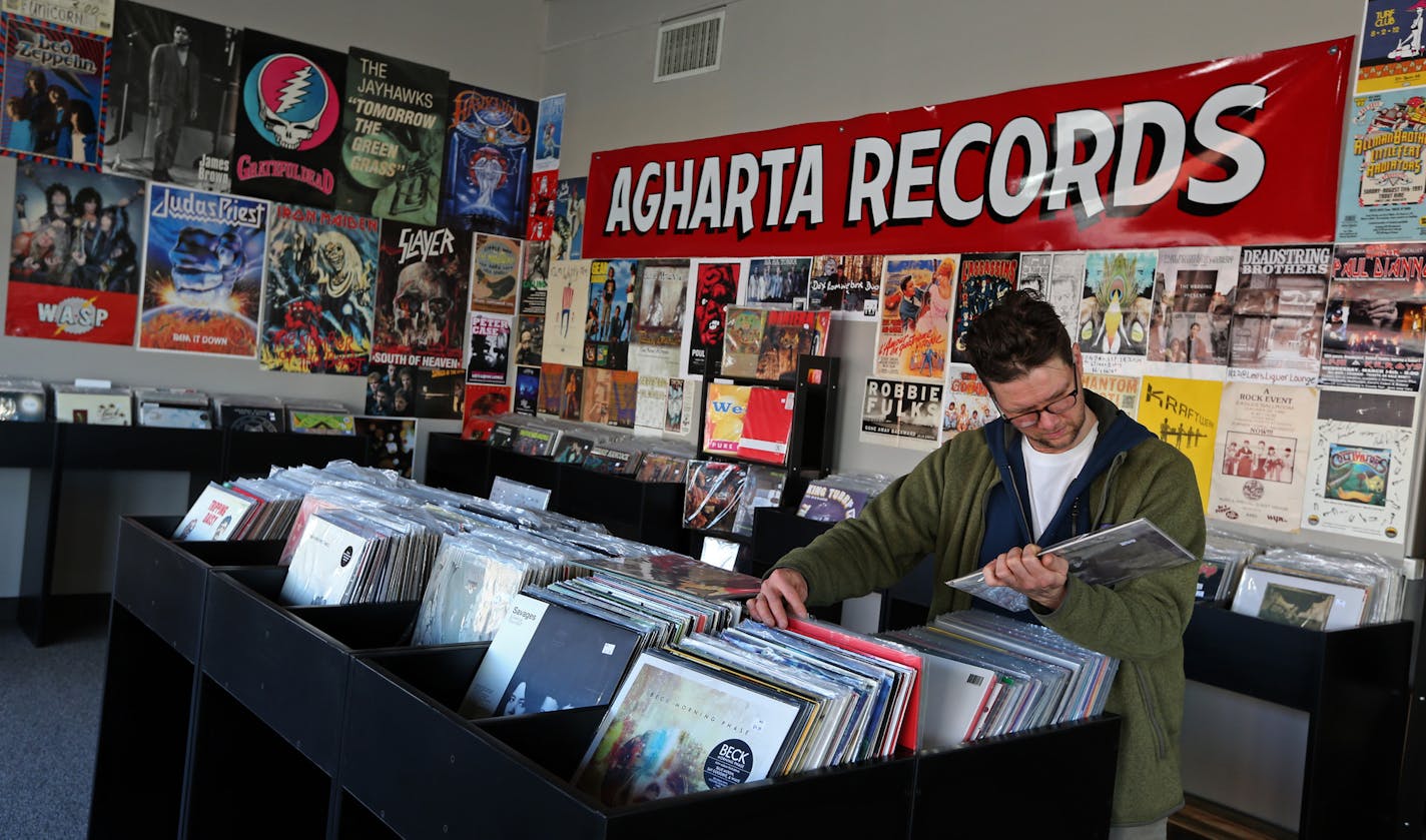 (left to right) Michael Elliot-Knight of St. Paul looked through the vinyl records at Agharta Records in St. Paul on 4/11/14.] Bruce Bisping/Star Tribune bbisping@startribune.com Michael Elliot-Knight/source.