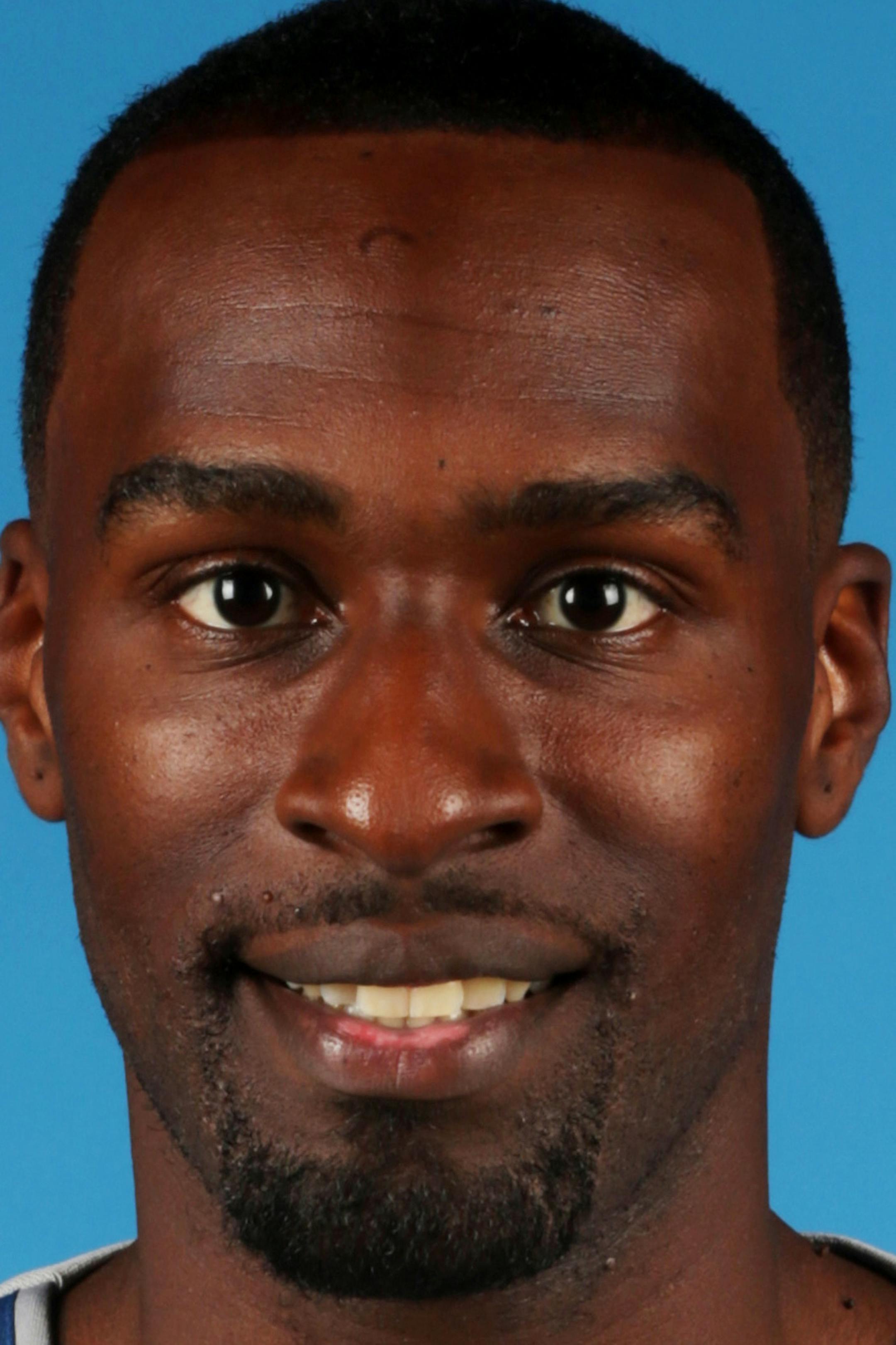 Minnesota Timberwolves' Shabazz Muhammad poses for media day photos Monday, Sept. 29, 2014, in Minneapolis. (AP Photo/Jim Mone) ORG XMIT: MP10