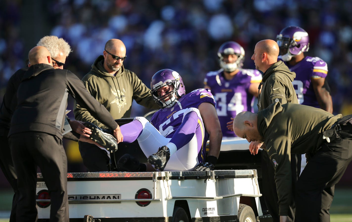 Vikings middle linebacker Audie Cole (57) was helped onto a cart after he fractured his right ankle in the fourth quarter Sunday afternoon. ] JEFF WHEELER � jeff.wheeler@startribune.com The Minnesota Vikings beat the St. Louis Rams 21-18 in overtime on a 40 yard Blair Walsh field goal Sunday afternoon, November 8, 2015 at TCF Bank Stadium in Minneapolis.