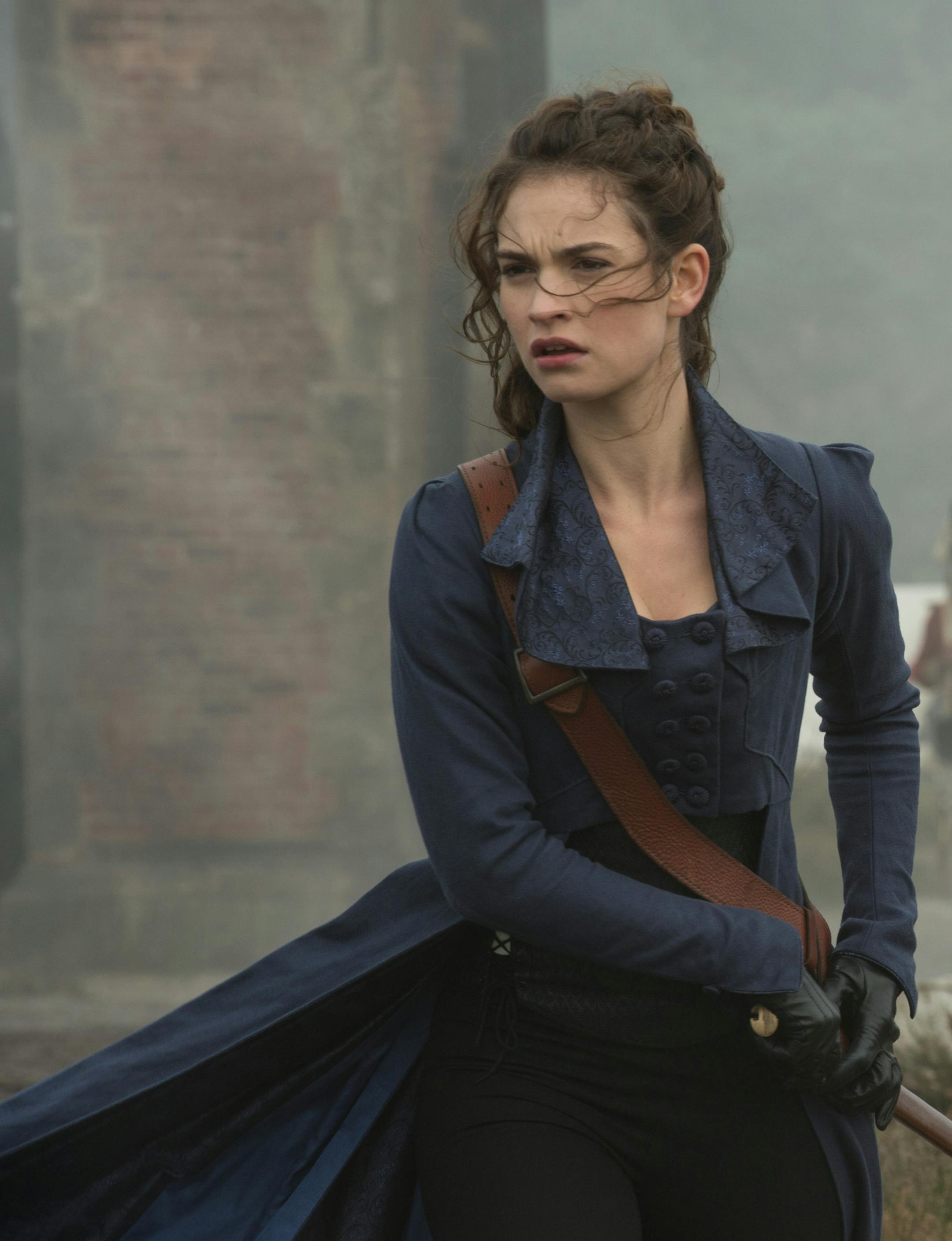 Lily James in Screen Gems' PRIDE AND PREJUDICE AND ZOMBIES. ORG XMIT: Lily James (Finalized)