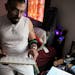Greg Sanchez, who has been living with HIV for 30 years, displays his many medications stored in the bedroom of his Chicago home on Wednesday, June 3,