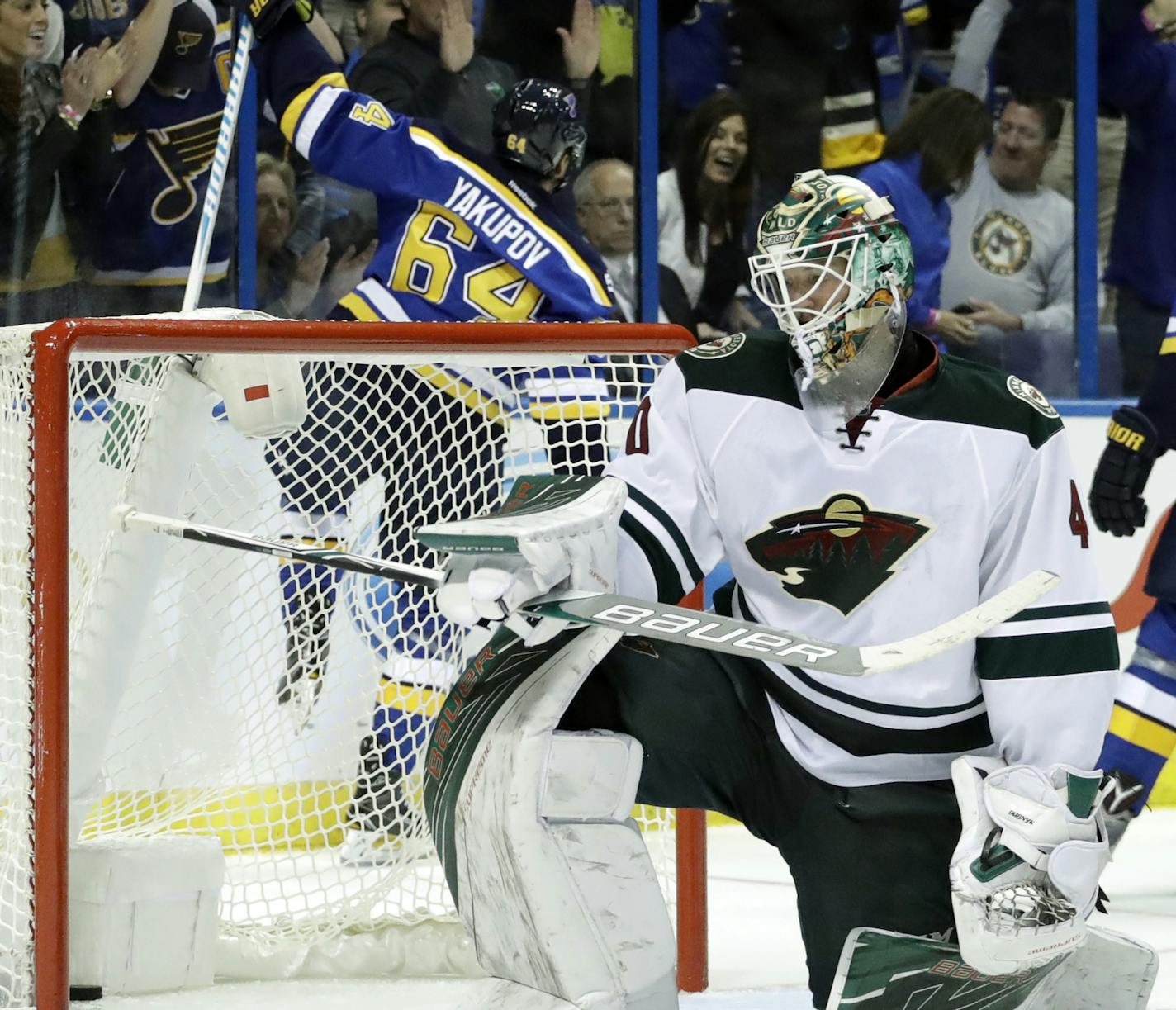 St. Louis Blues's Nail Yakupov (64), of Russia, celebrates after scoring past Minnesota Wild goalie Devan Dubnyk during the second period of an NHL hockey game Thursday, Oct. 13, 2016, in St. Louis. (AP Photo/Jeff Roberson)