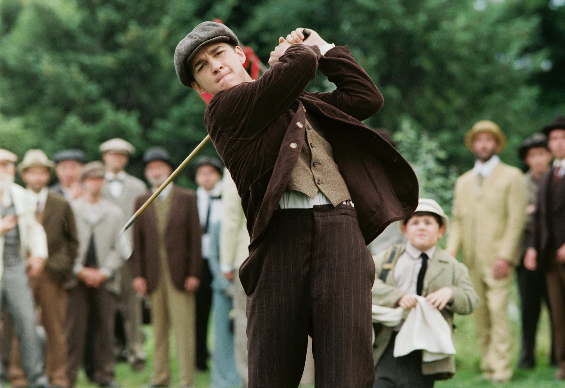 Shia LaBeouf, center, Josh Flitter, center right are shown in this undated promotional still from the film "The Greatest Game Ever Played." The Walt Disney Co. is marketing the movie to faith-based groups even though the film, about Francis Ouimet's improbable win in the 1913 U.S. Open, isn't overtly religious. (AP Photo/The Walt Disney Co., Jonathan Wenk)