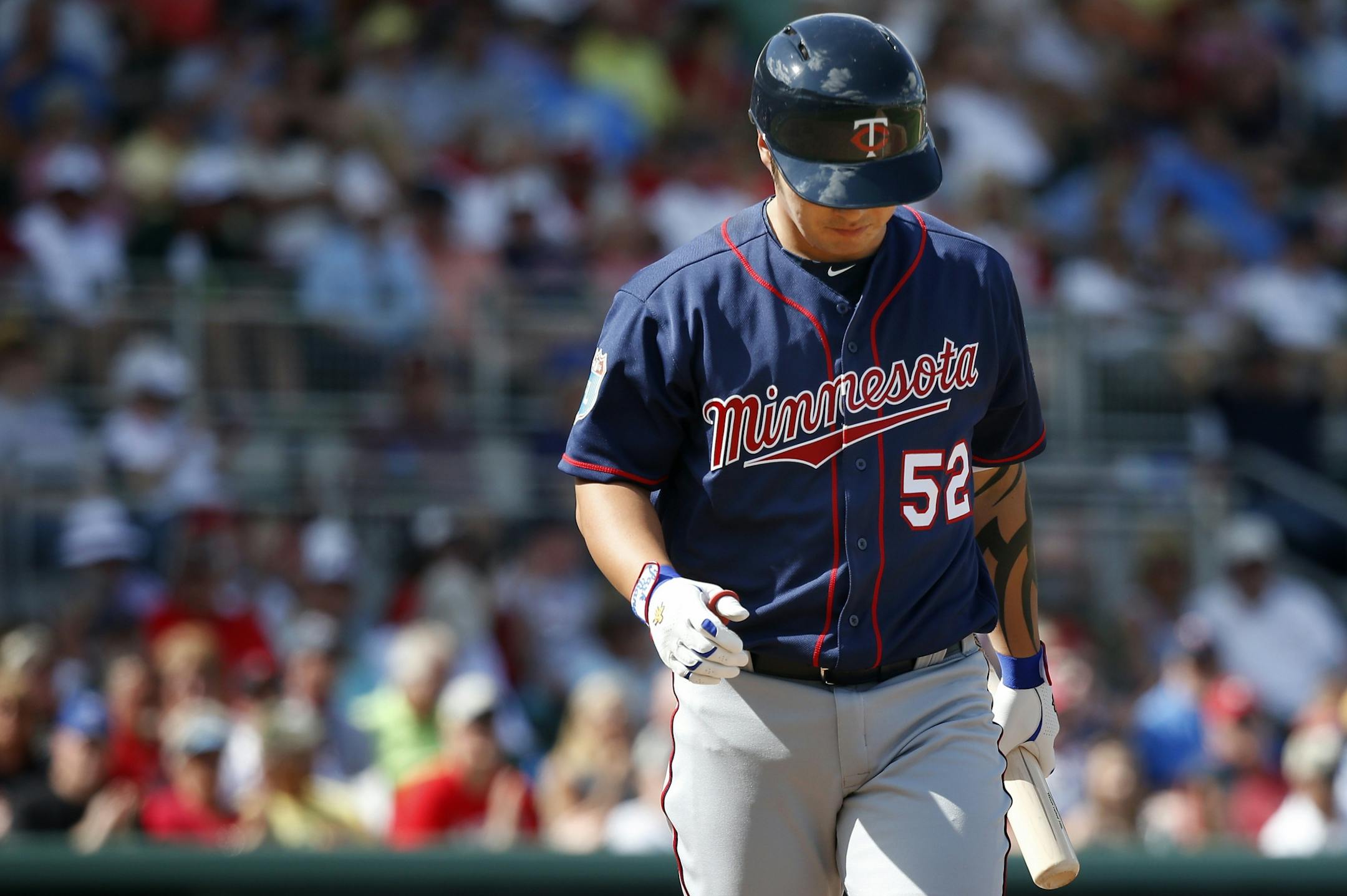 Minnesota Twins Byung Ho Park walked back to the dugout after striking out in the fifth inning.