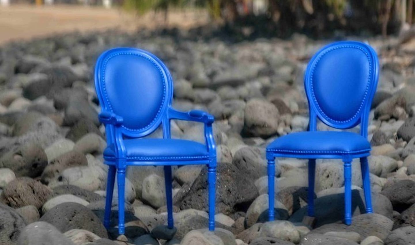 Neutrals still reign but blues are trending, as seen in these outdoor French chairs.