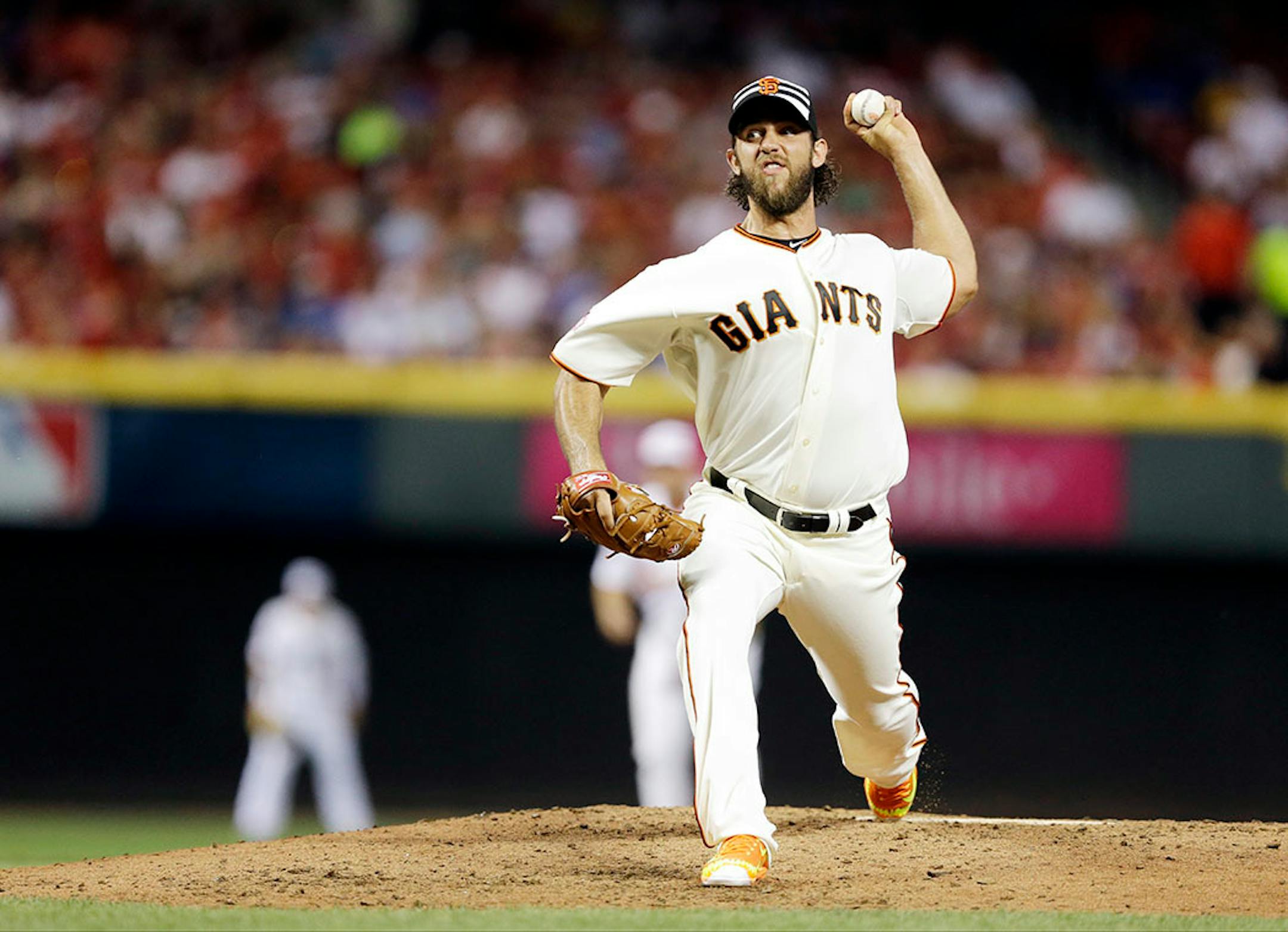 National League's Madison Bumgarner, of the San Francisco Giants, throws during the fourth inning of the MLB All-Star baseball game, Tuesday, July 14, 2015, in Cincinnati.