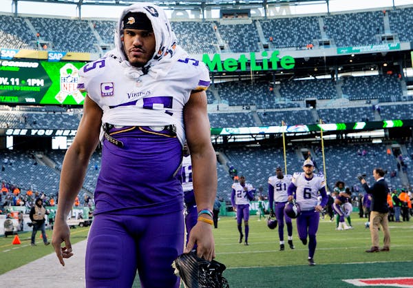 Anthony Barr (55) walked off the field at the end of a game.
