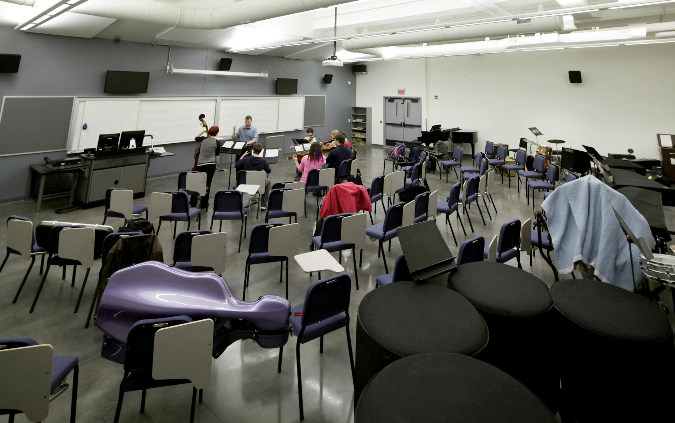 Nicholas Gaudette conducted a rehersal with orchestra members Marisse Minell, Maria Post, Arlen Taylor, Aaron Rahrola, Krystal Nugent, Shelbi J. Drayna, and Lacy White at the new music building at Anoka-Ramsey Community College. Anoka-Ramsey Community College threw open the doors to its new music building this winter.March 19, 2013. ] JOELKOYAMA‚Ä¢joel koyama@startribune.com MAGIC SAXO NUMBER IS 107085 (Possible centerpiece) Anoka-Ramsey Community College threw open the doors to