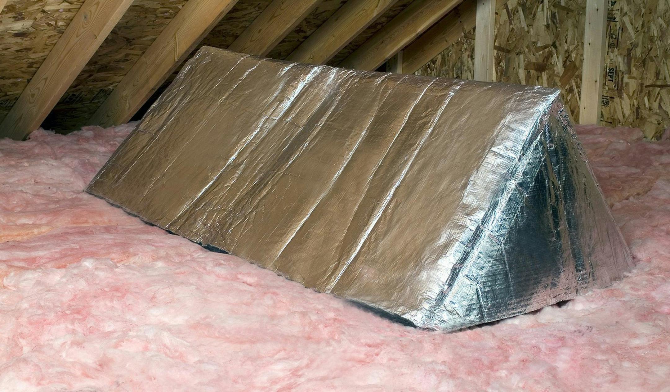 Owens Corning's Attic Stairway Insulator is a tent made from insulating material and reflective foil that covers the stairway opening. Uninsulated attic hatches are a common spot where heated air escapes into an attic. (Owens Corning/MCT) ORG XMIT: 1141780