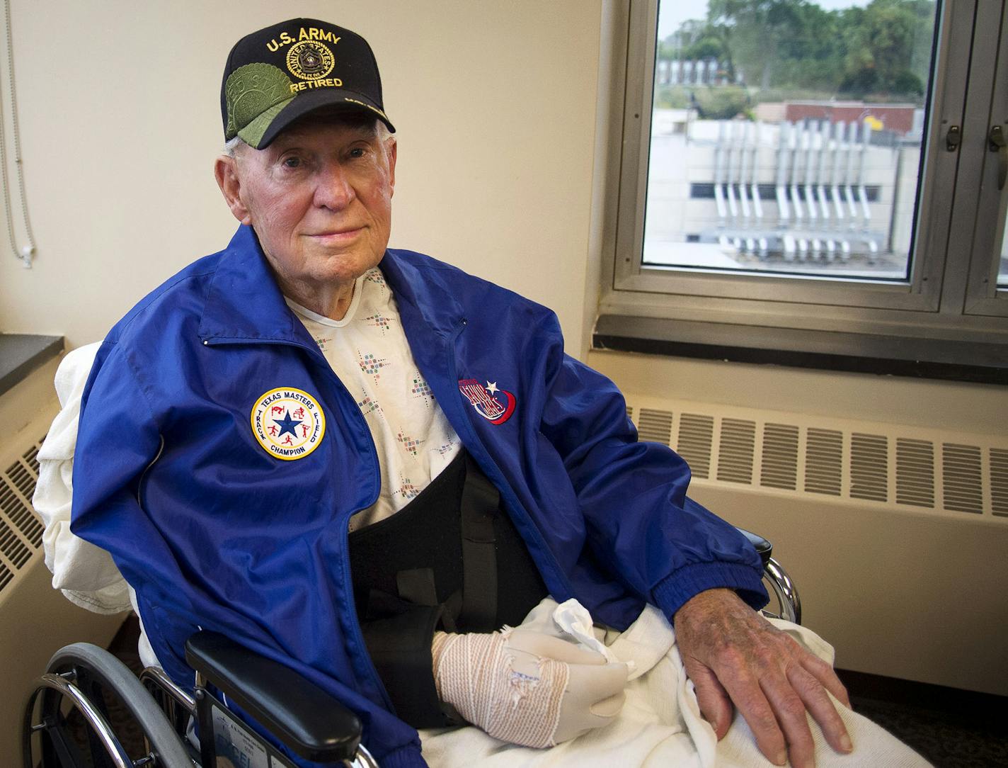 Earl Blassingame, of McKinney, Texas, posed at Regions Hospital in St. Paul, Minn. on Thursday August 6, 2015. ] RACHEL WOOLF &#xb7; rachel.woolf@startribune.com Earl Blassingame, of McKinney, Texas, fell while throwing a shot-put at the senior Olympic games in Blaine earlier this summer. He shattered his elbow, shoulder, broke his hip and got a steel rod in his thigh.