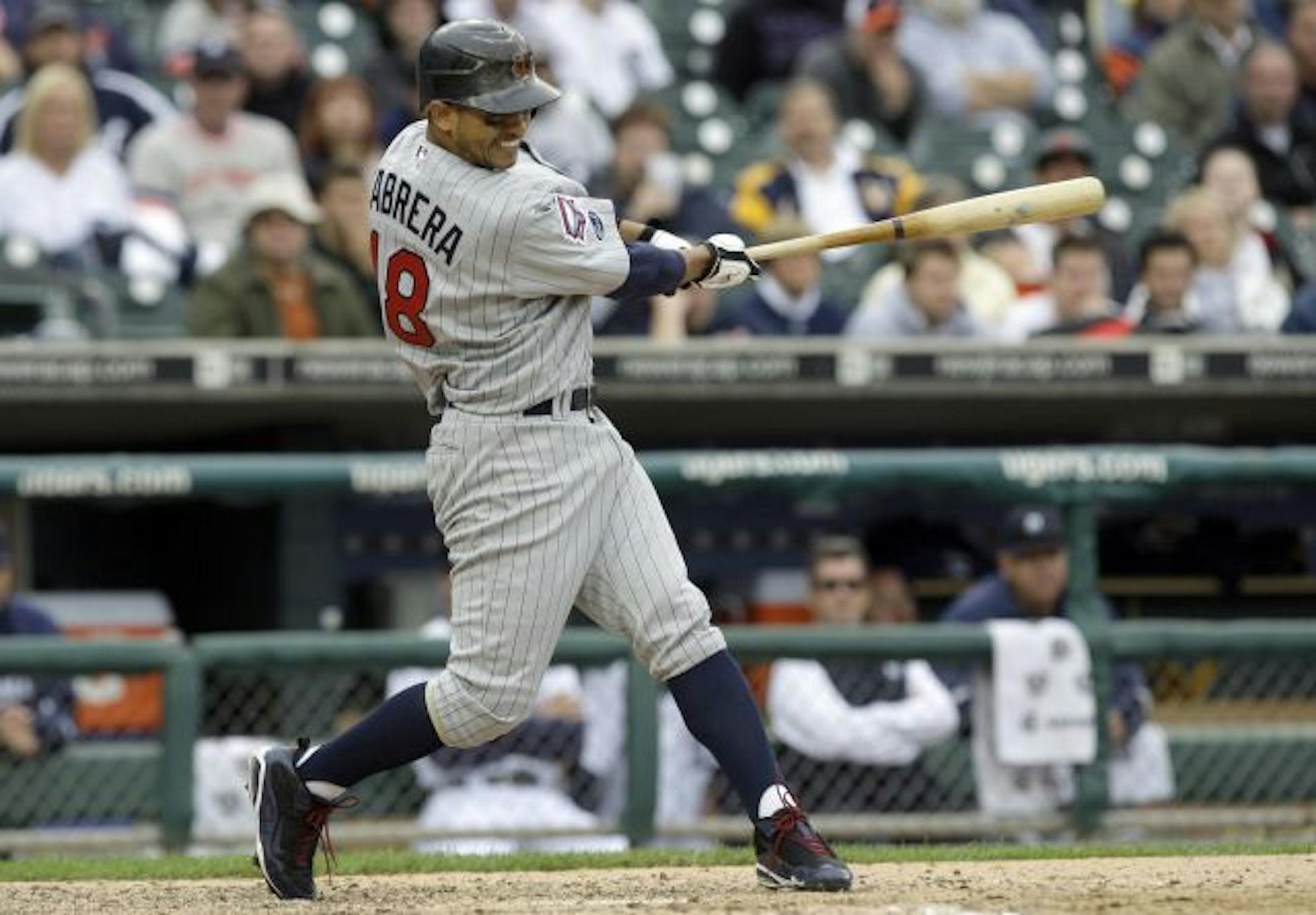 Orlando Cabrera hit an RBI single against the Detroit Tigers in the 10th inning in the first game of a day-night doubleheader on Tuesday in Detroit. Denard Span scored the go ahead run.