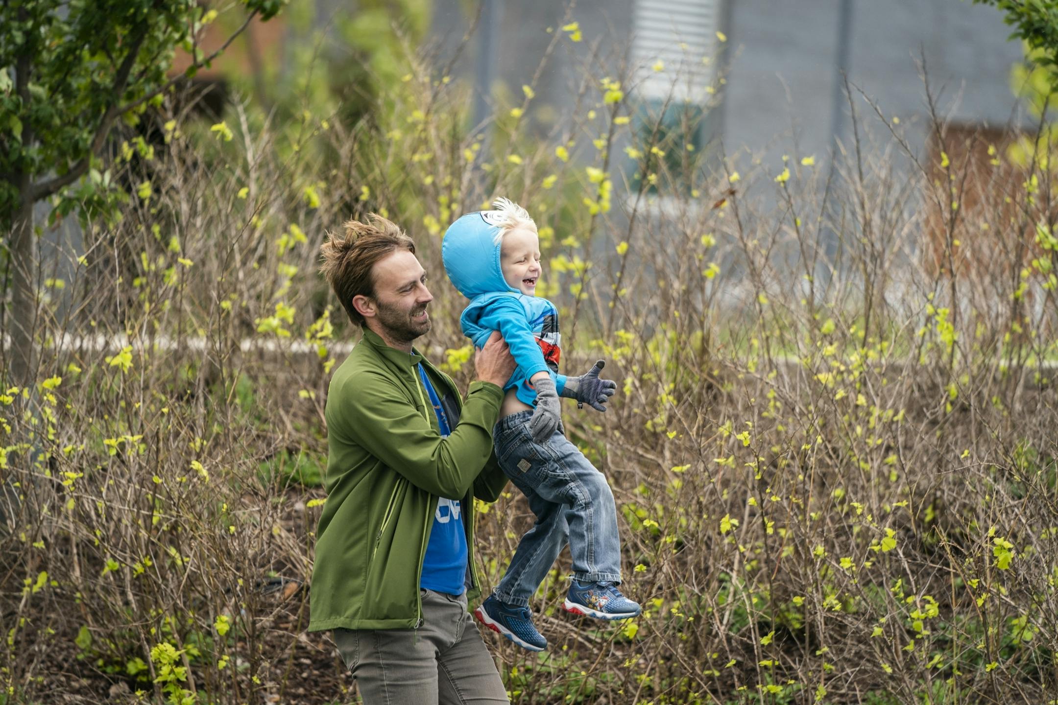 Keith Nagel plays with his son Sawyer, 3, during a Twin Cities Dads playgroup at Central Park in Maple Grove.
