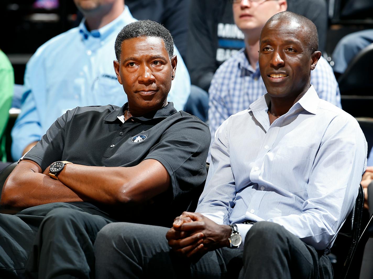 Timberwolves interim head coach Sam Mitchell and General Manager Milt Newton watched the team scrimmage on Monday.