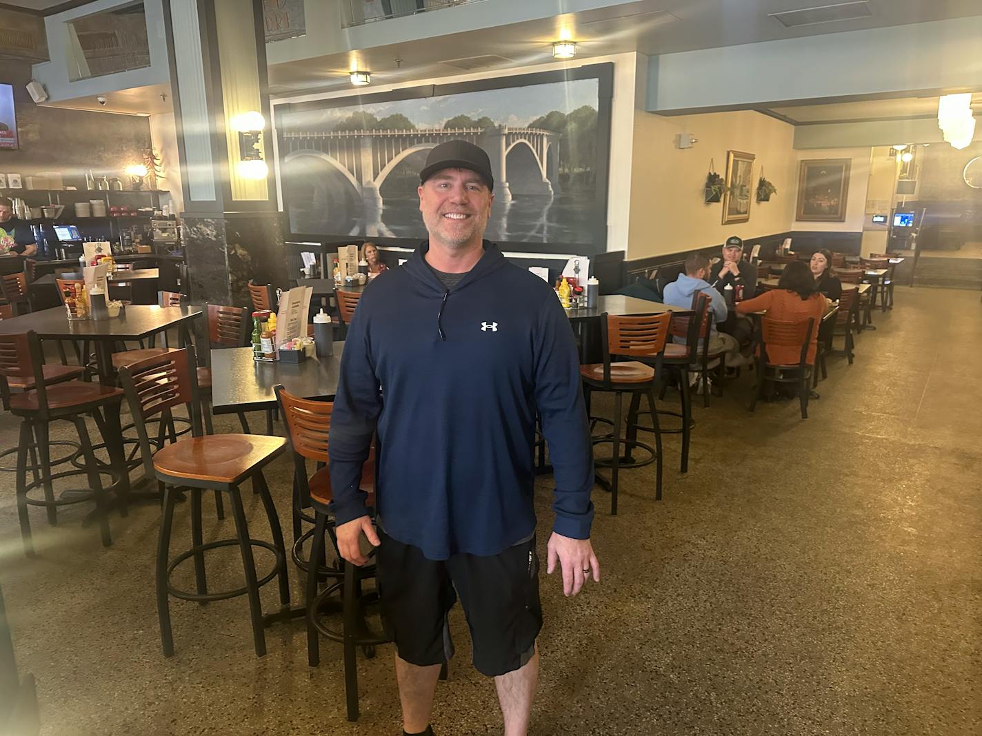 Chad Selton, manager of Keys Cafe in downtown Minneapolis, poses for a photo on Friday, March 7, 2025. The local restaurant chain recently instituted a surcharge for eggs.