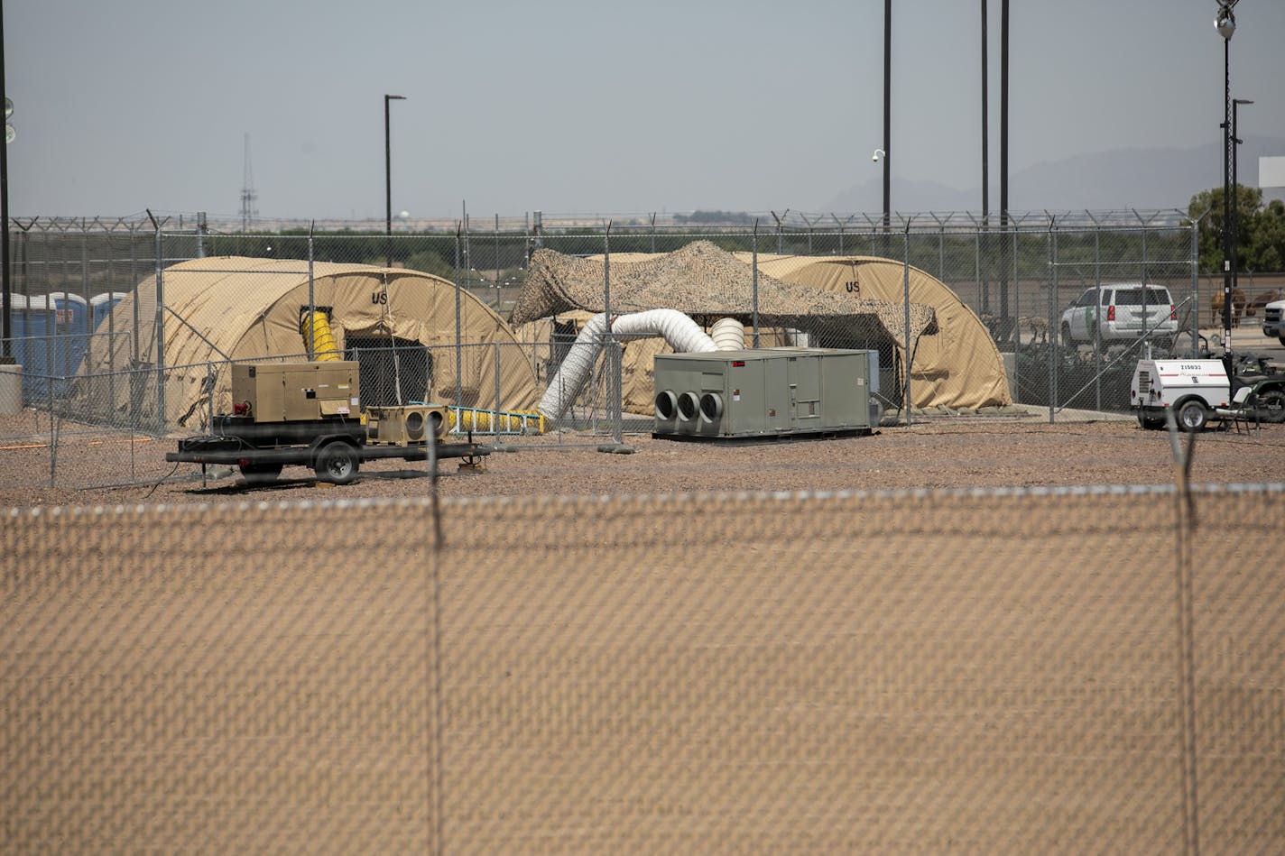 Tents at a U.S. Customs and Border Protection station where migrants were being held in Clint, Texas, June 25, 2019. The House on Thursday passed a Senate humanitarian aid package without any of the House&#x2019;s strict protections for migrant children in overcrowded border shelters, after Speaker Nancy Pelosi (D-Calif.) capitulated to Republicans and Democratic moderates in a striking defeat. (Ivan Pierre Aguirre/The New York Times)