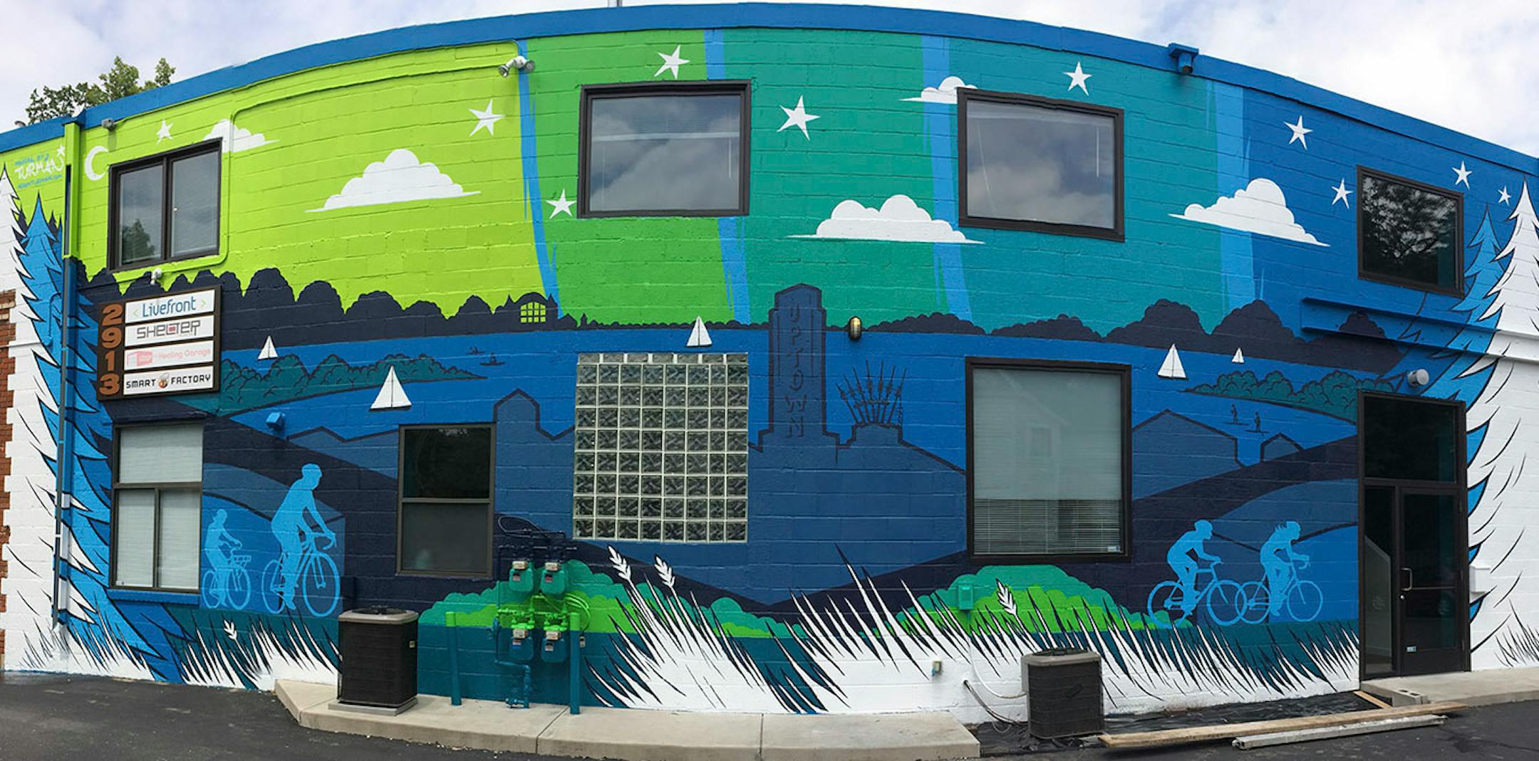 The everywhere artist, Adam Turman, His clean, dynamic murals crawl up the sides of breweries, in elementary schools, the lobby of downtown Minneapolis' hip, new hotel. He boasts T-shirts and pint glasses and posters. He's even created a jigsaw puzzle.