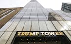 FILE - This March 16, 2016 file photo shows Trump Tower in New York. The average price per square foot for condos sold in Trump-branded buildings in t