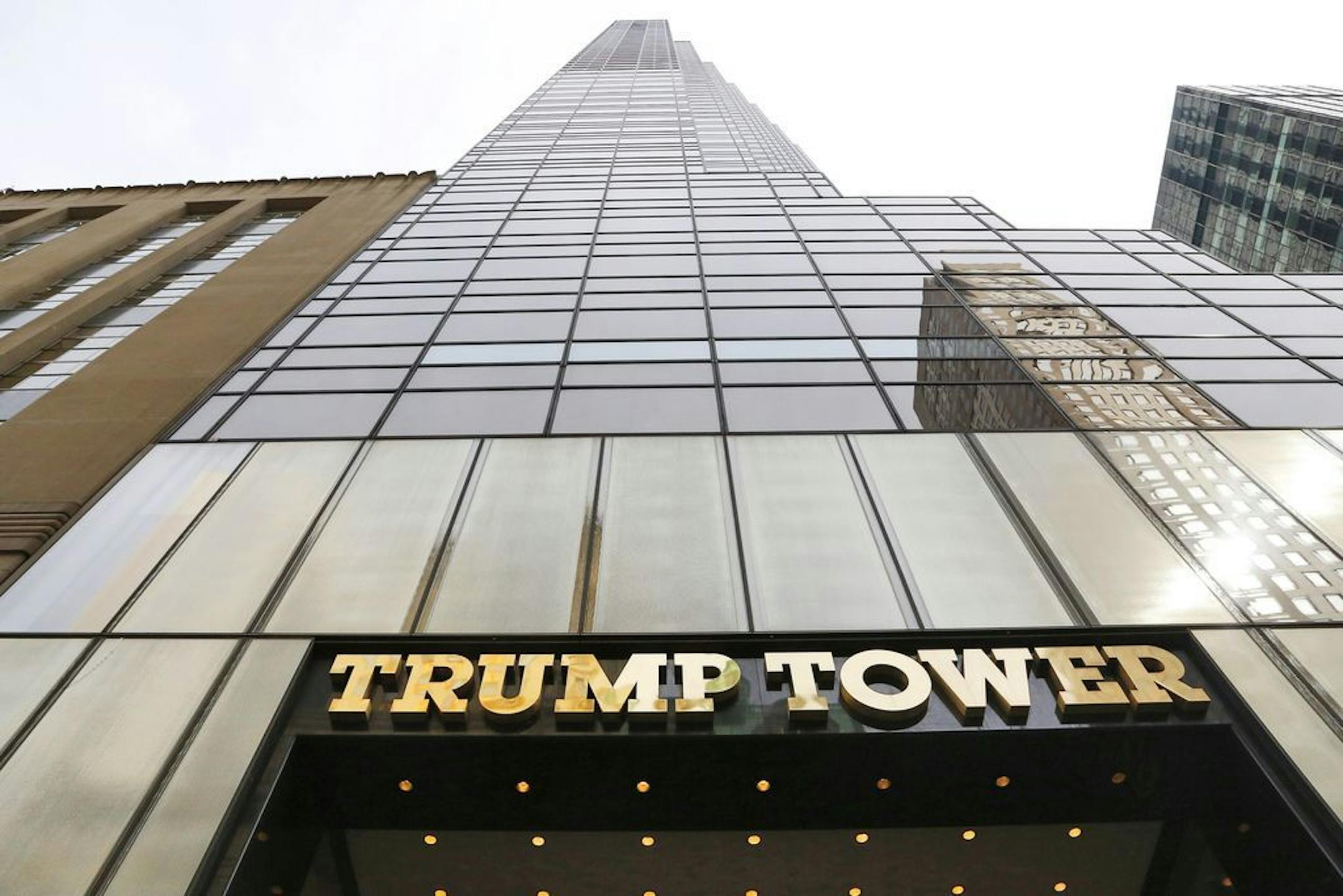 FILE - This March 16, 2016 file photo shows Trump Tower in New York. The average price per square foot for condos sold in Trump-branded buildings in the borough fell 7 percent in the 12 months through November compared to the year earlier, according to a report Wednesday, Dec. 13, 2017 by research firm CityRealty. Prices dropped in eight of 11 Trump buildings.