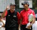 In this June 16, 2008, file photo, Rocco Mediate joked with Tiger Woods following Woods' U.S. Open championship victory at Torrey Pines Golf Course in