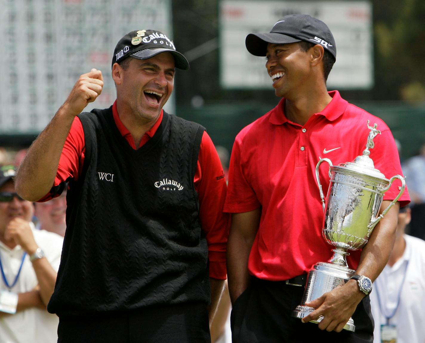 In this June 16, 2008, file photo, Rocco Mediate joked with Tiger Woods following Woods' U.S. Open championship victory at Torrey Pines Golf Course in San Diego.