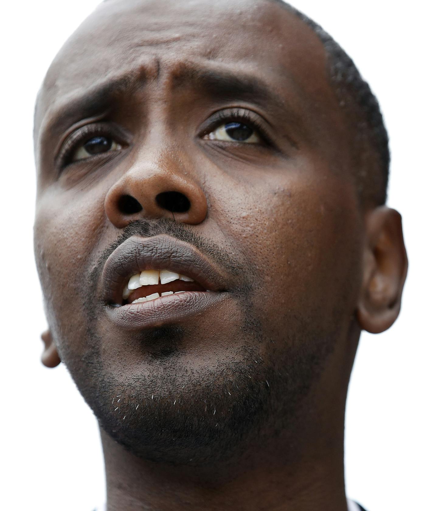 Minneapolis City Council Member Abdi Warsame held a press conference at the Darul Quba Cultural Center on Sunday. ] CARLOS GONZALEZ &#xef; cgonzalez@startribune.com - July 23, 2017, Minneapolis, MN, Minneapolis City Council Member Abdi Warsame talks about the Damond shooting, along with members of the East African community.