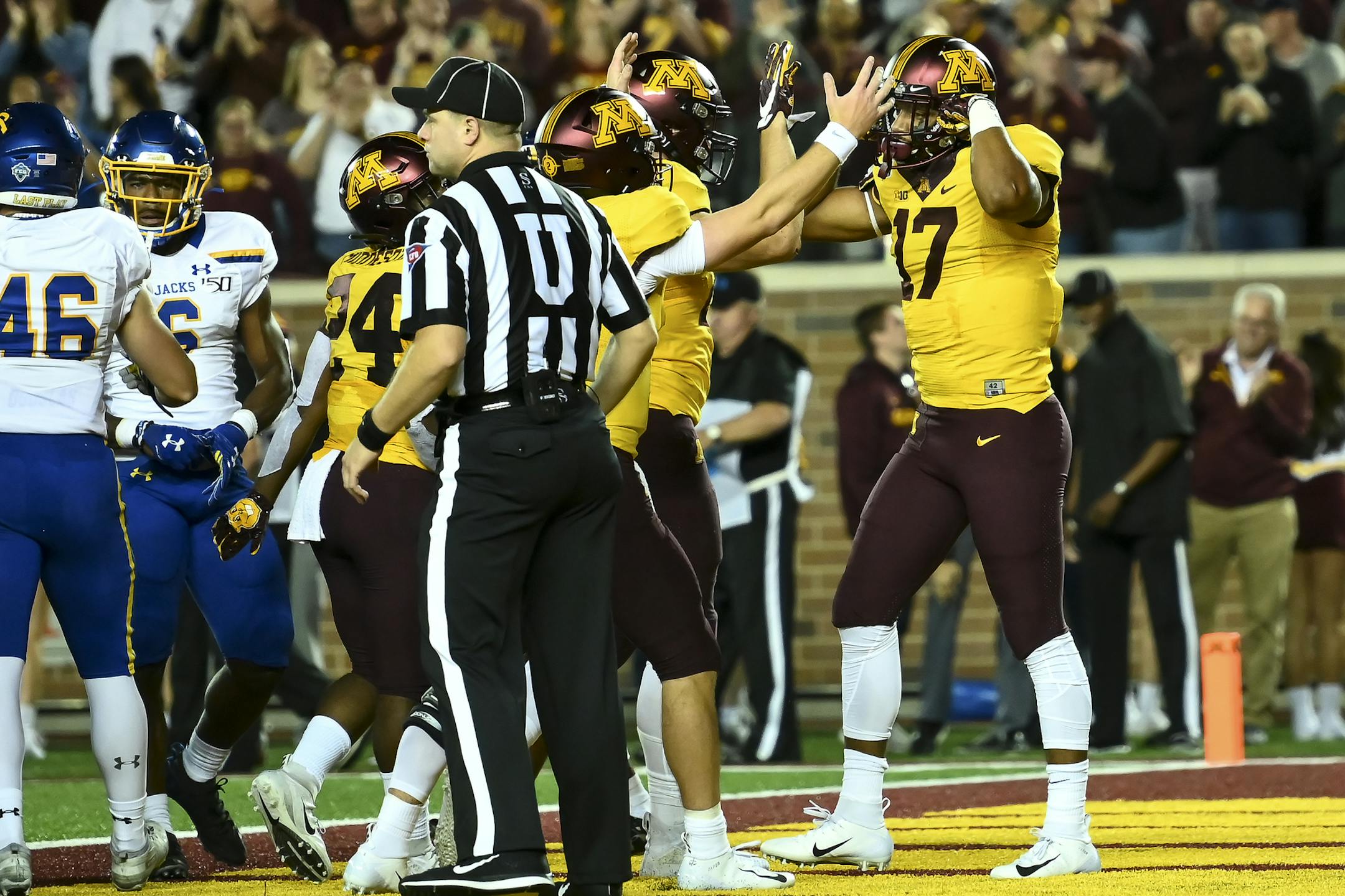 Teammates celebrated with Minnesota Gophers wide receiver Seth Green (17) after Green's second quarter rushing touchdown. ] Aaron Lavinsky • aaron.lavinsky@startribune.com The Minnesota Gophers played South Dakota State Jackrabbits on Thursday, Aug. 29, 2019 at TCF Bank Stadium in Minneapolis, Minn.