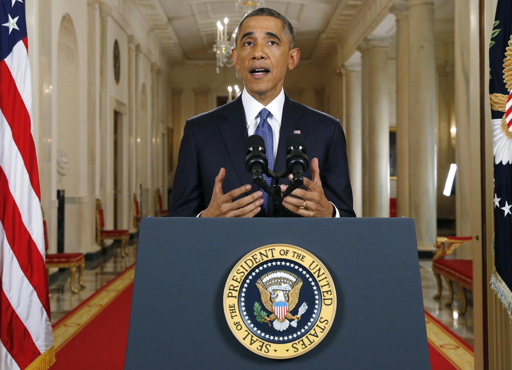 President Barack Obama speaks during a nationally televised address from the White House in Washington, Thursday, Nov. 20, 2014. Spurning furious Republicans, President Barack Obama unveiled expansive executive actions on immigration Thursday night to spare nearly 5 million people in the U.S. illegally from deportation and refocus enforcement efforts on "felons, not families." (AP Photo/Jim Bourg, Pool) ORG XMIT: MIN2014112114525019