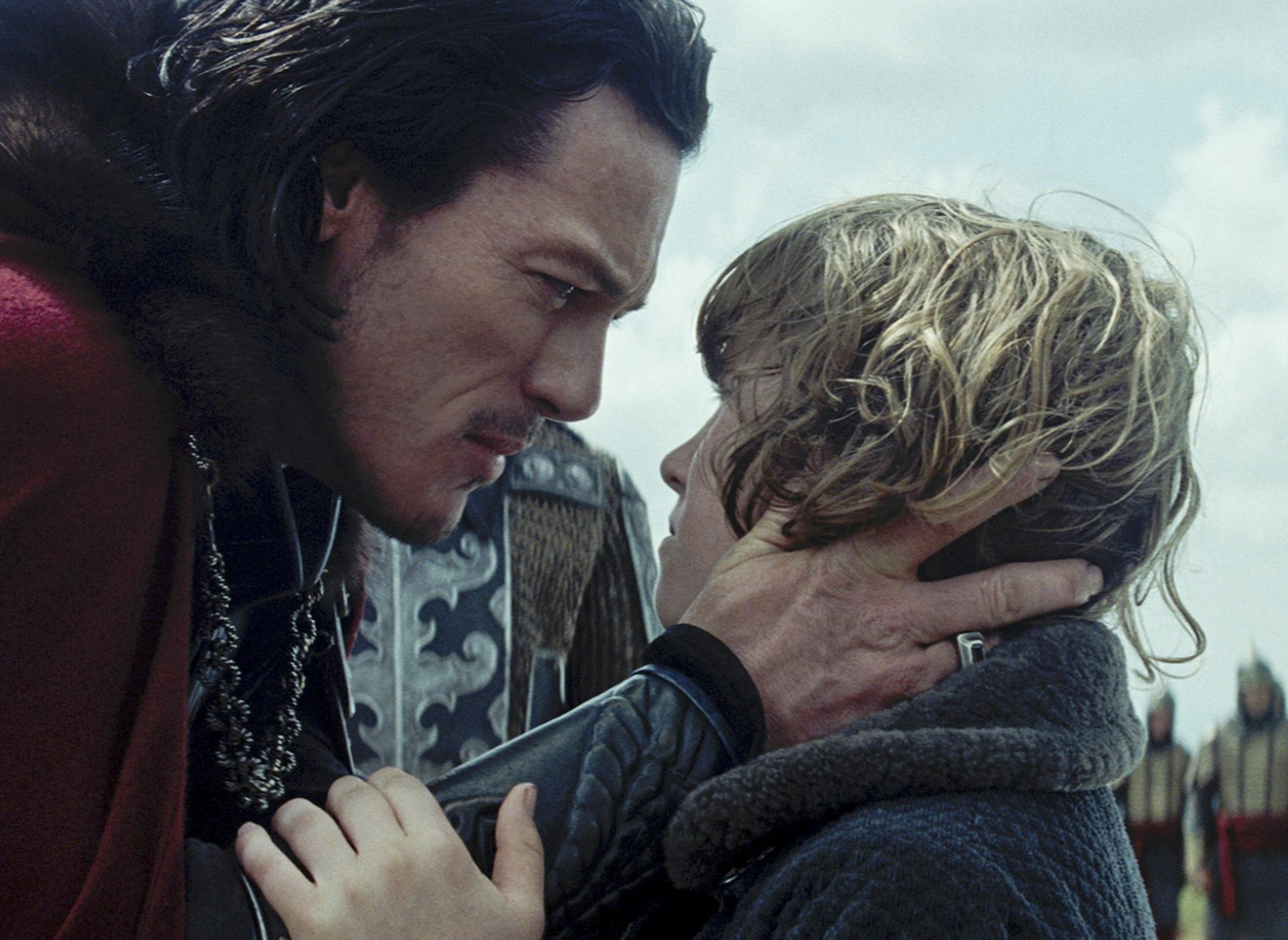 Vlad (LUKE EVANS) warns his son, Ingeras (ART PARKINSON), to run in "Dracula Untold", the origin story of the man who became Dracula. Gary Shore directs and Michael De Luca produces the epic action-adventure.