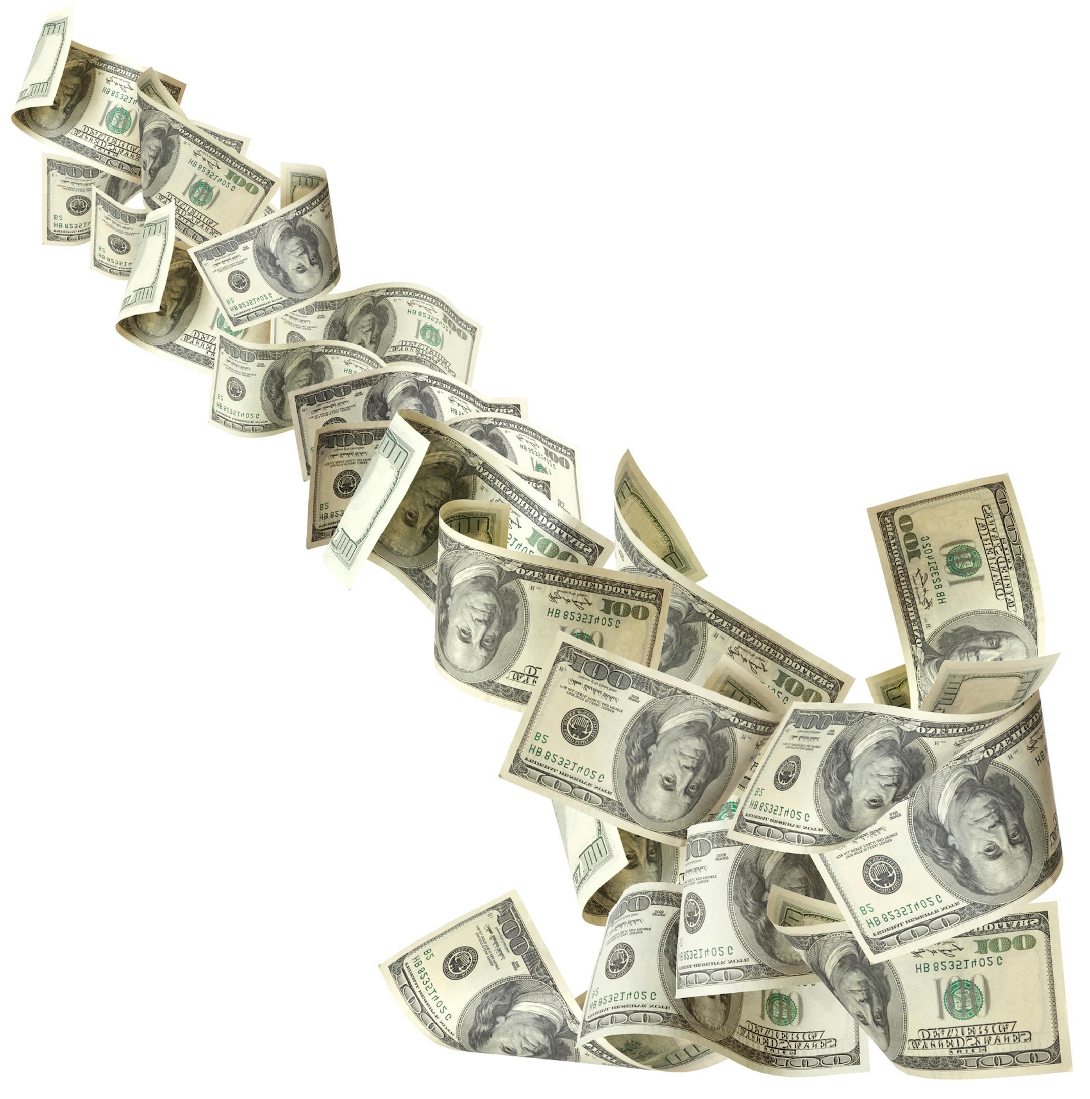 Arrow composition of one hundred dollar paper currency flying isolated on white.