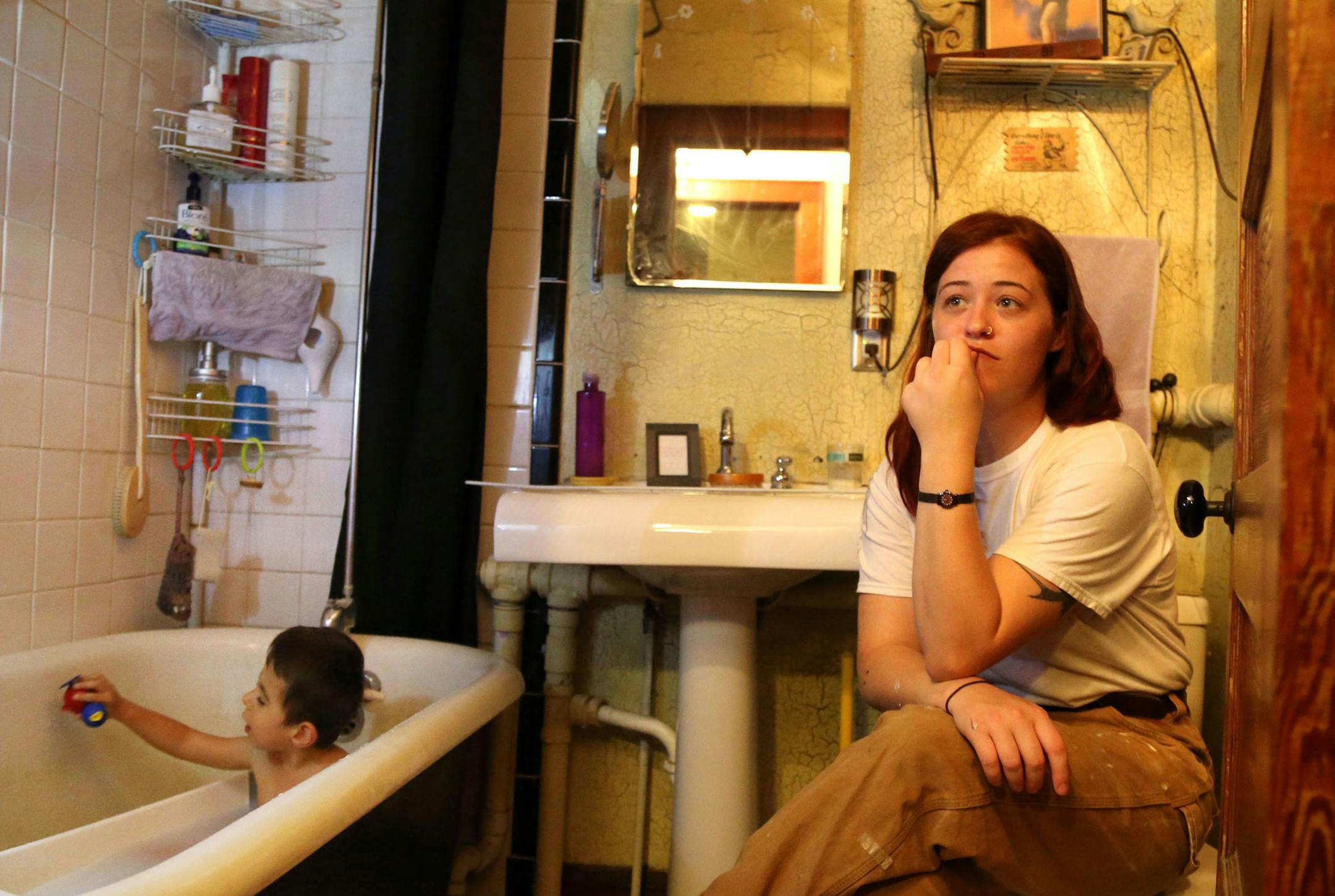 Simon Heil is a 3-year-old boy who lives in northeast Minneapolis with his mother, Cristin Heil. He is blind and has cerebral palsy and hydrocephalus, a condition in which the brain swells with excess fluid. Here, Simon plays in the bathtub as he mother talks about the daunting job of single parenting Simon, without respite care and little outside help at their home Thursday, Oct. 8, 2015, in Minneapolis, MN.](DAVID JOLES/STARTRIBUNE)djoles@startribune.com Across Minnesota, thousands of disabled