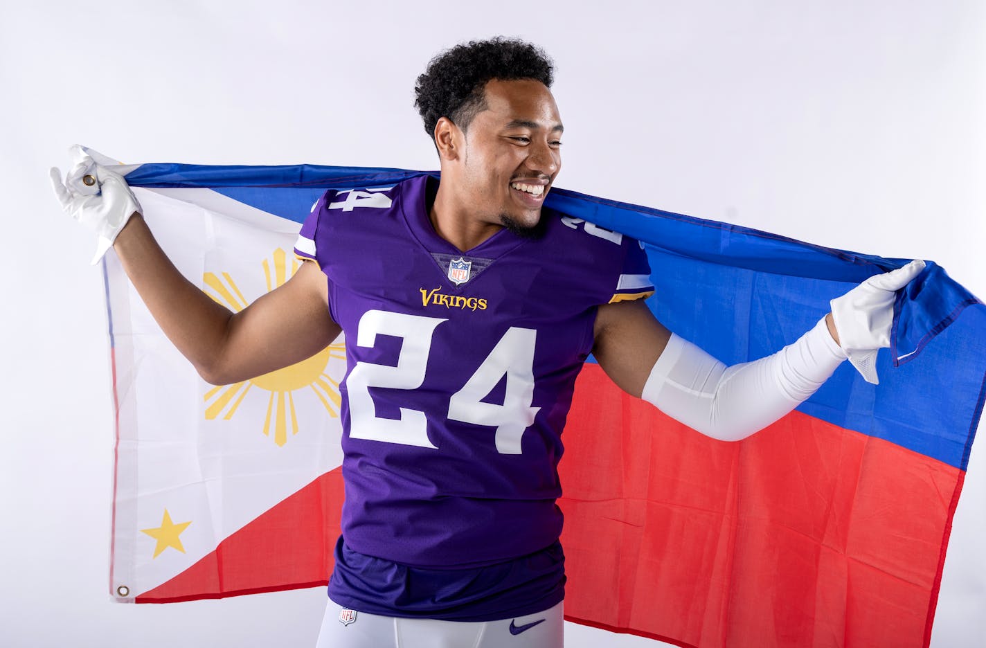 Minnesota Vikings safety Camryn Bynum (24) photographed with the national flag of the Philippines May 2023. ] CARLOS GONZALEZ • carlos.gonzalez@startribune.com