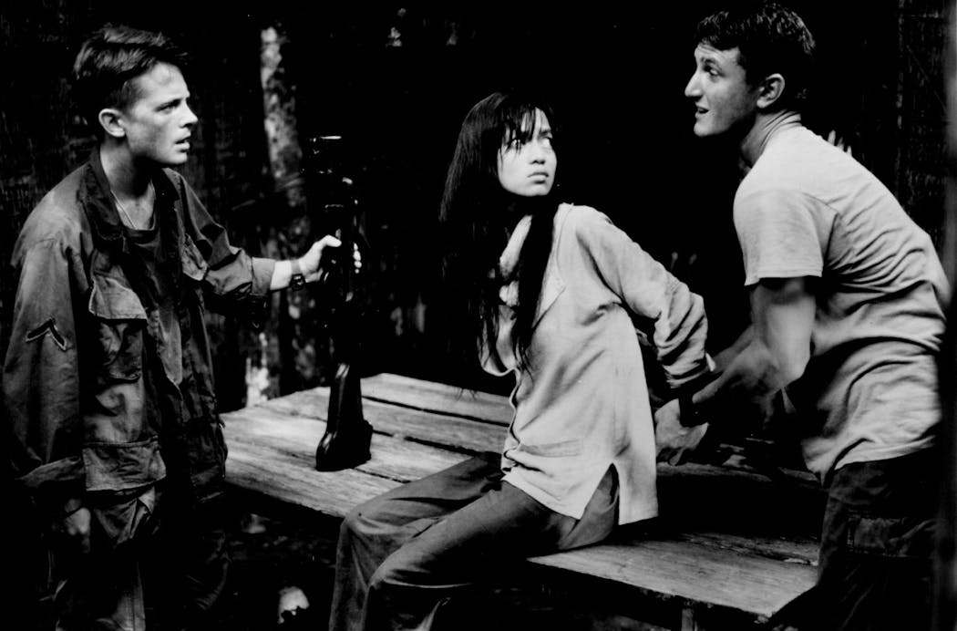 Michael J. Fox, Thuy Thu Le and Sean Penn in “Casualties Of War.” 